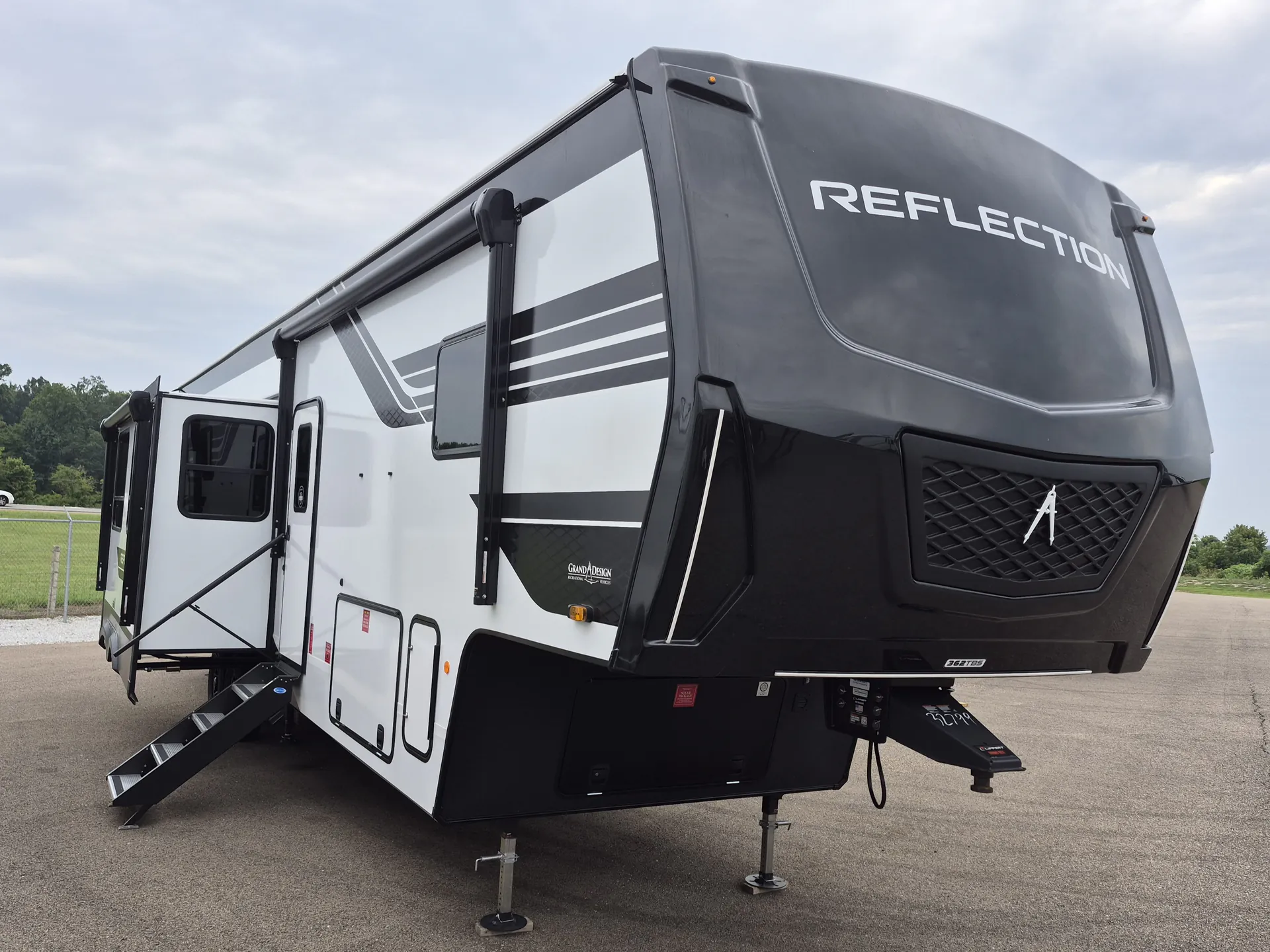 2027 Grand Design Reflection 362TBS — Photograph clearly shows the fifth-wheel RV exterior, front cap, awning, steps, and landing gear
