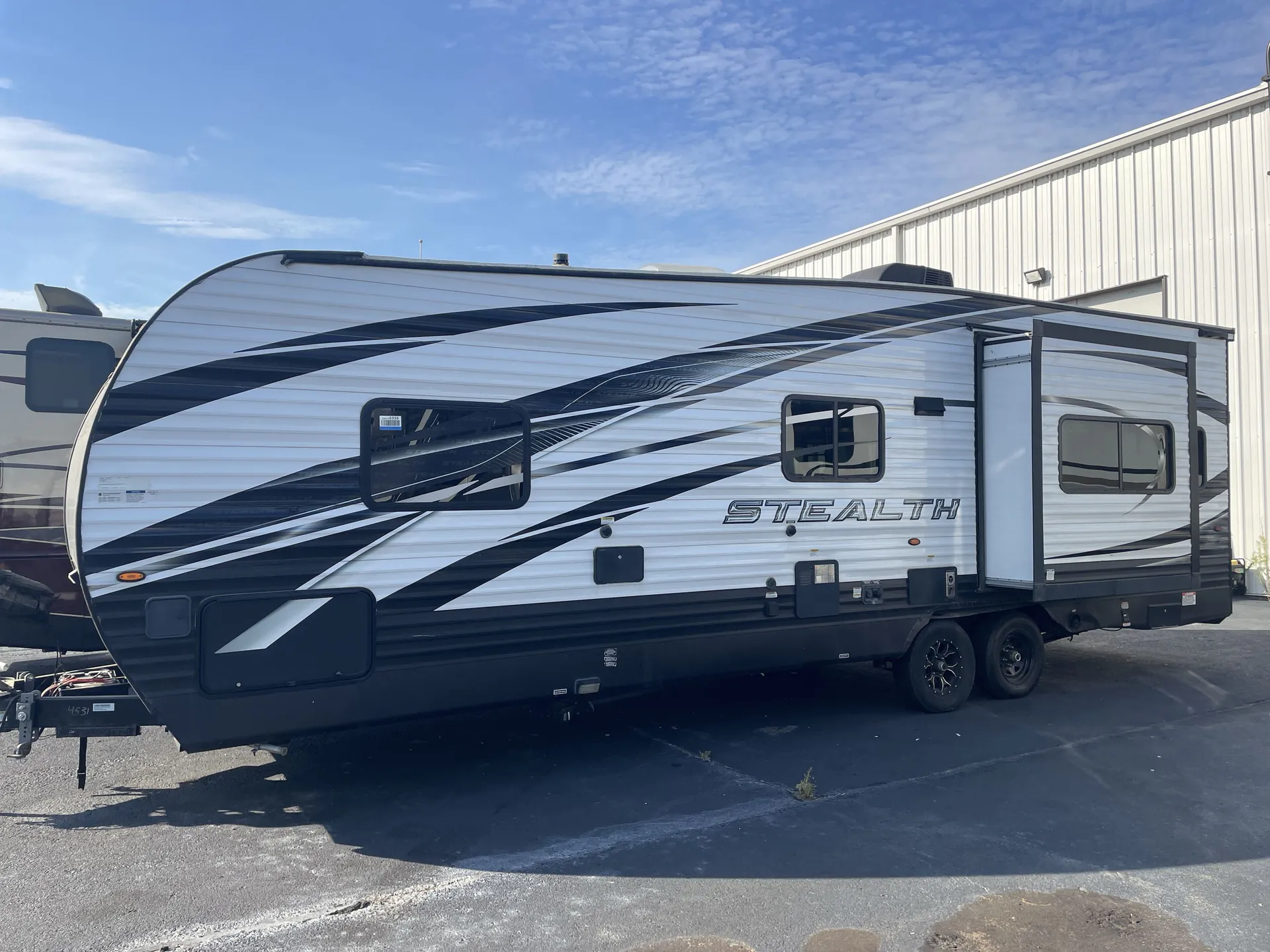 2023 Forest River Stealth RQ2715 — off campside