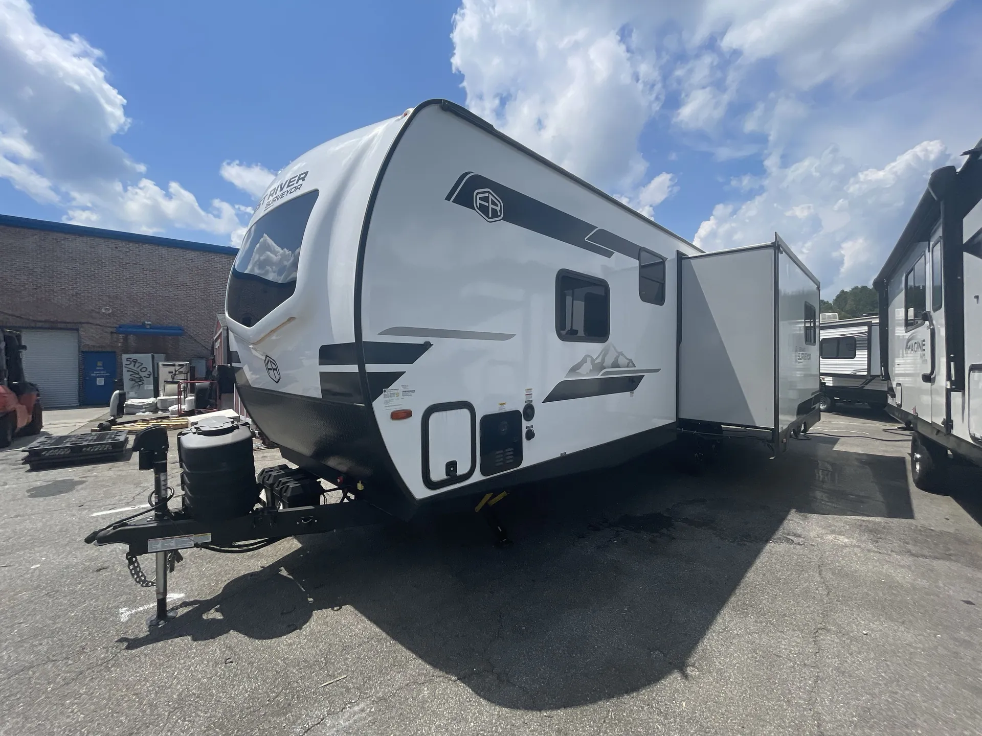 2025 Forest River Grand Surveyor 253RLS — campside