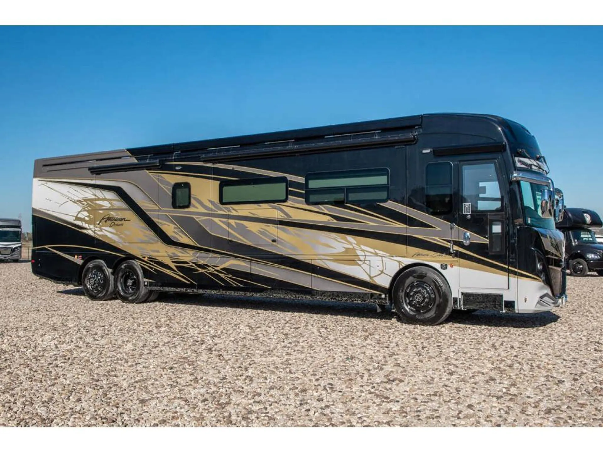 2026 American Coach American Dream 45A — Full exterior side profile of the motorhome with wheels, windows, and body shell
