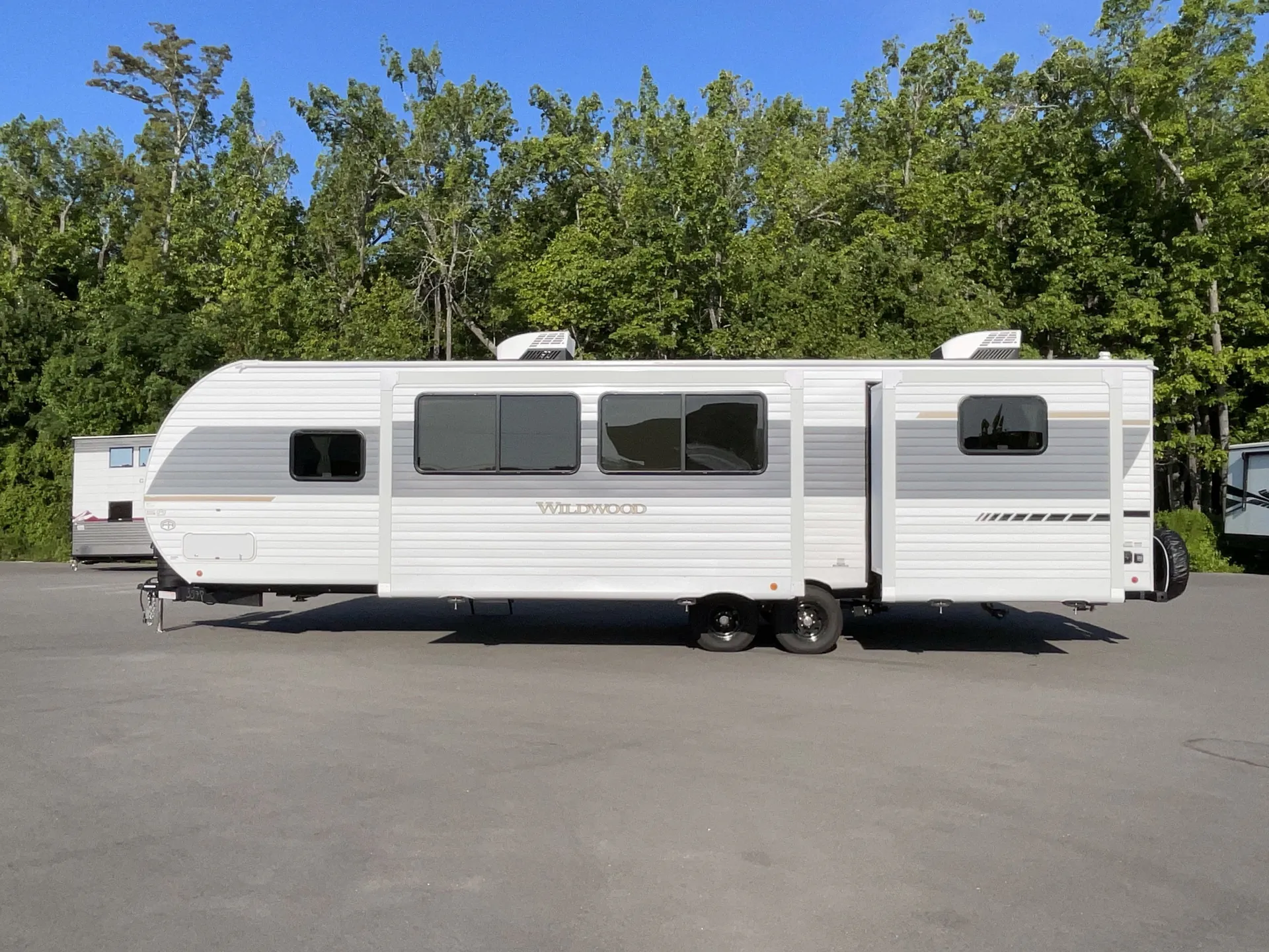 2027 Forest River Wildwood 31KQBTS — campside