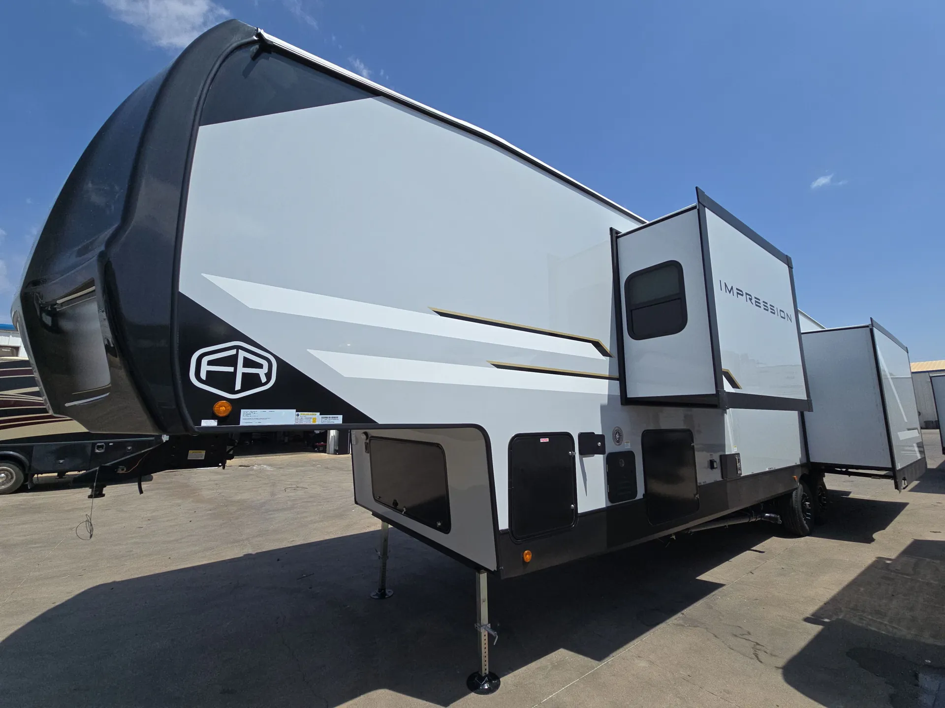 2027 Forest River Impression 360MYR — off campside
