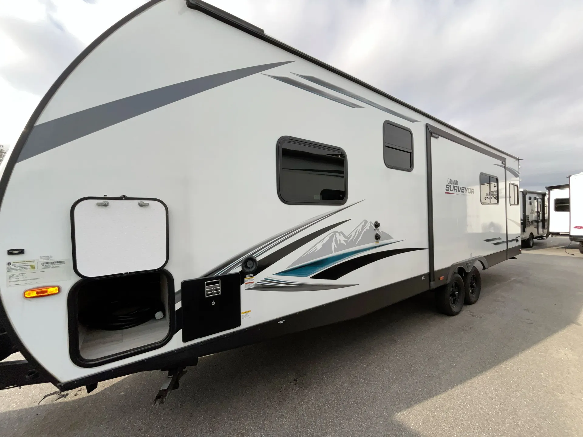 2023 Forest River Surveyor 253RLS — off campside