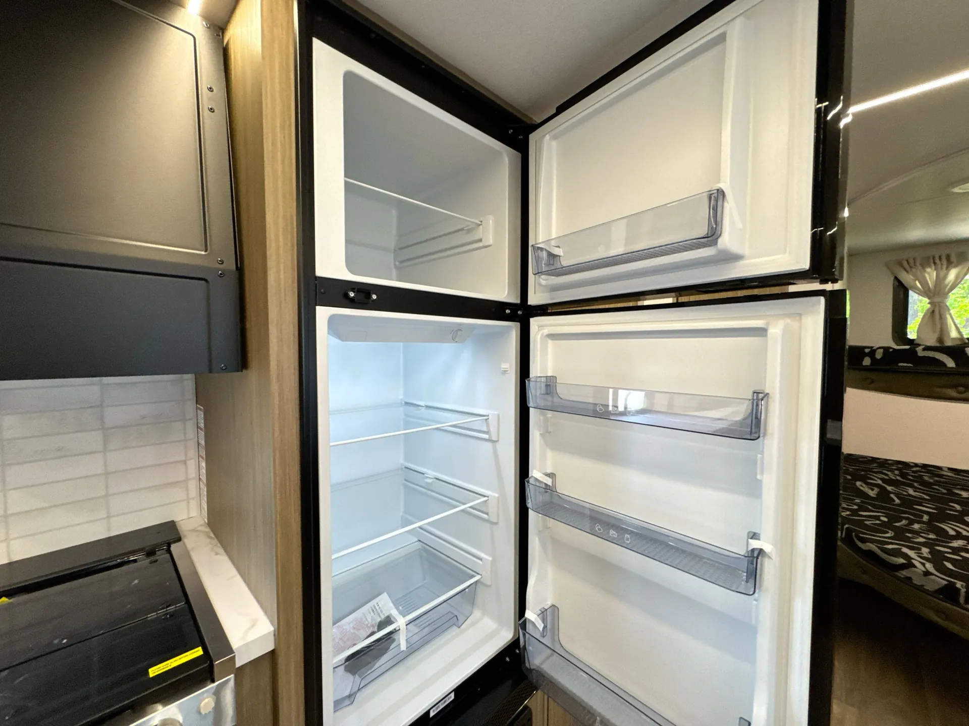 2026 Forest River Wildwood X-Lite 263BHXL — fridge open