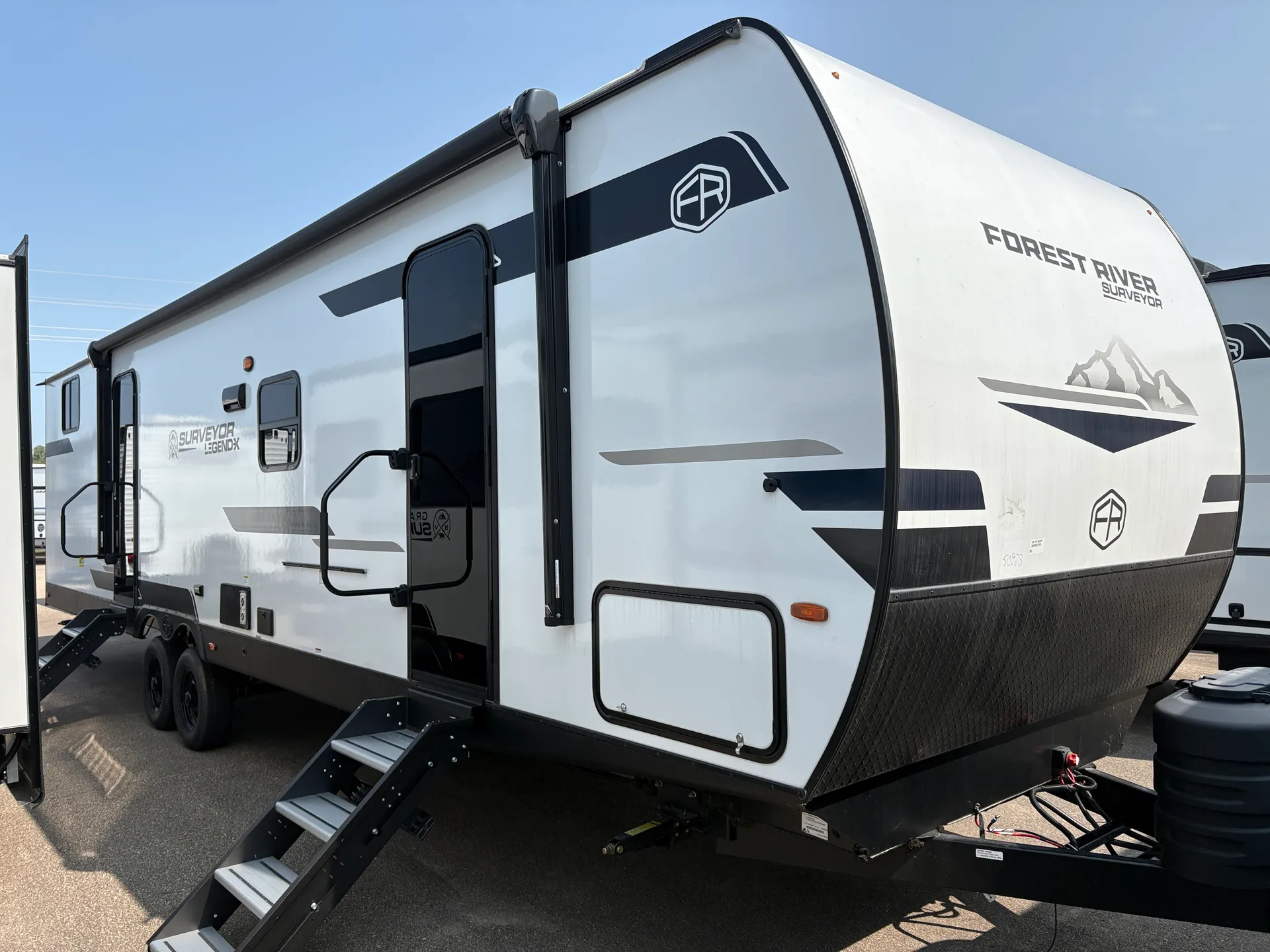 2025 Forest River Surveyor Legend X 32CAMP dealer photo 1 from A.C. Nelsen RV World