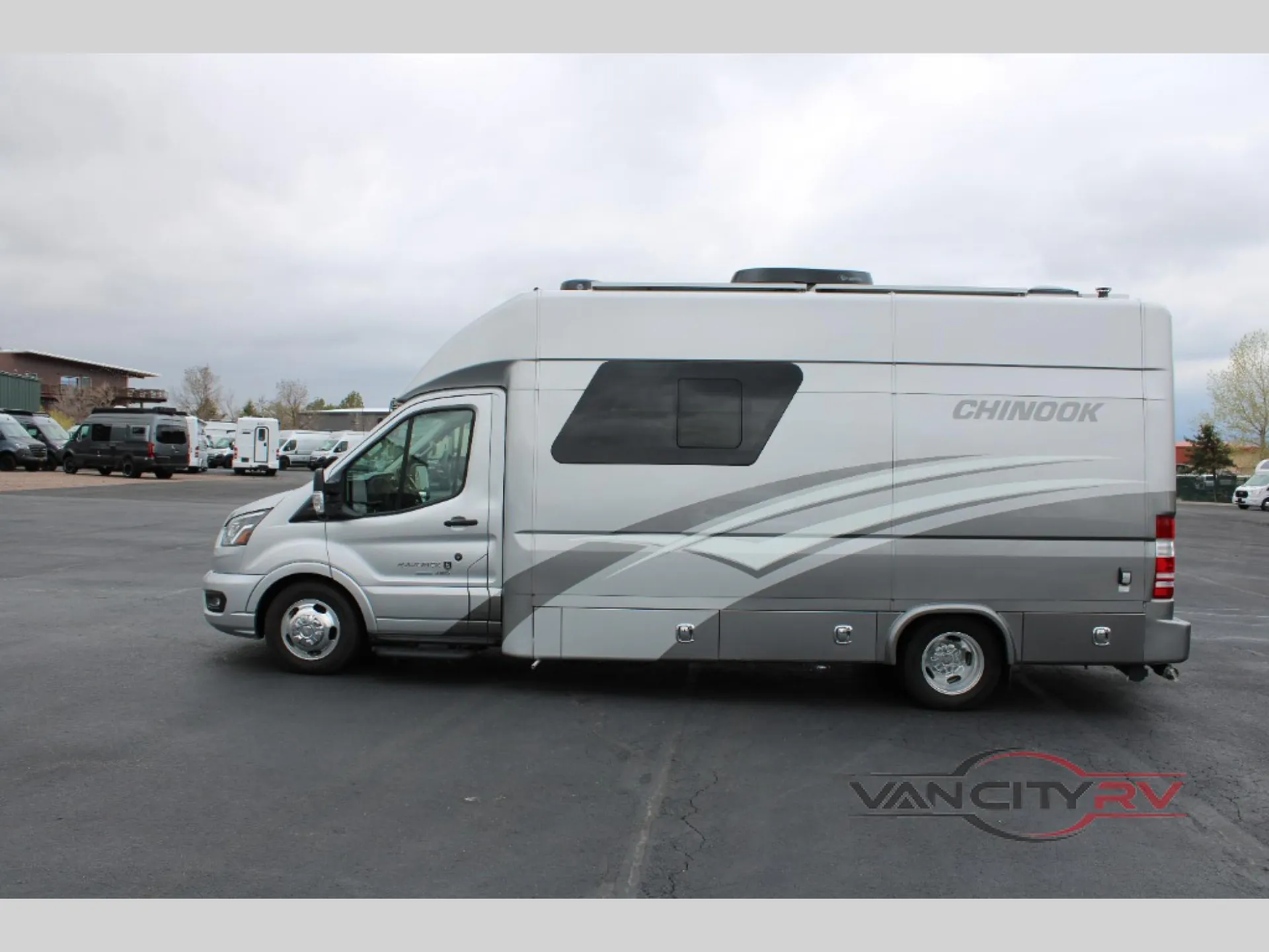 2025 Chinook RV Maverick SS — Side profile visibly shows the RV body, windows, wheels, and exterior graphics