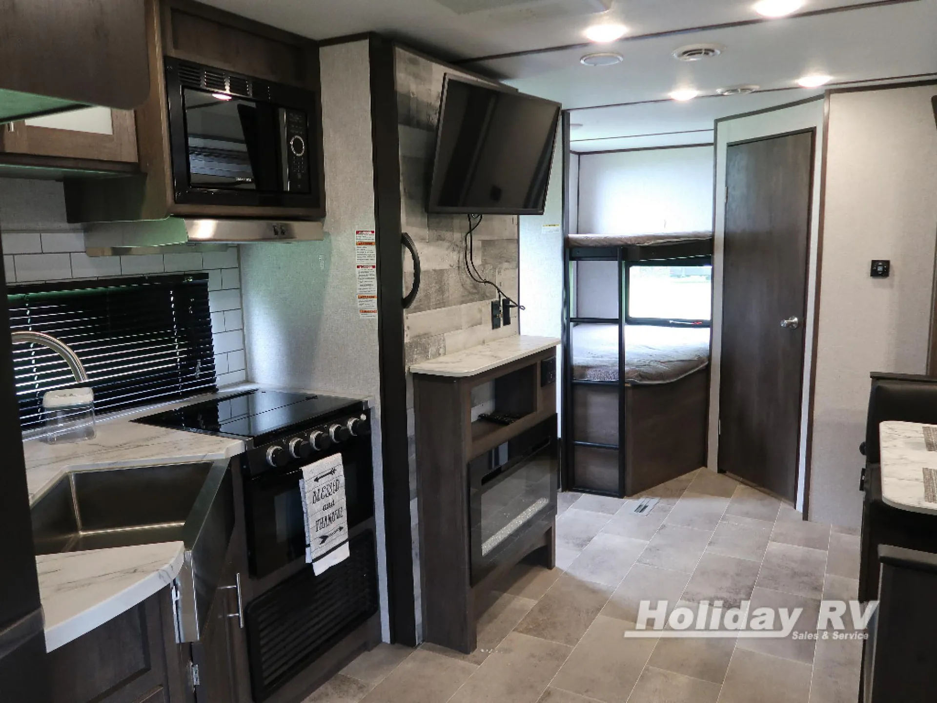 2021 Dutchmen Coleman Lantern 242BHWE dealer photo 2 from Holiday RV Sales and Service