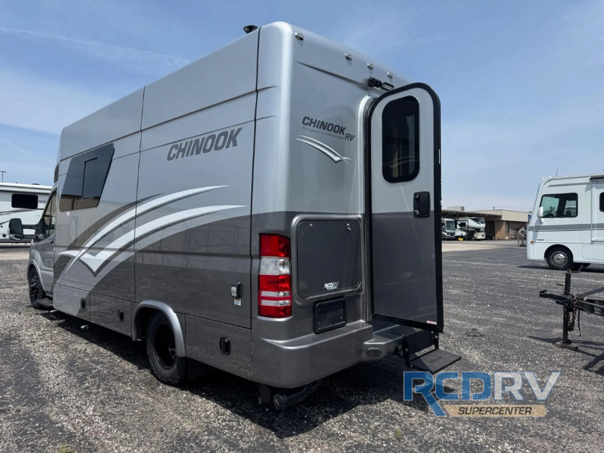 2025 Chinook RV Maverick SS — Exterior rear three-quarter photograph visibly shows the RV shell, rear door, lights, and side panels