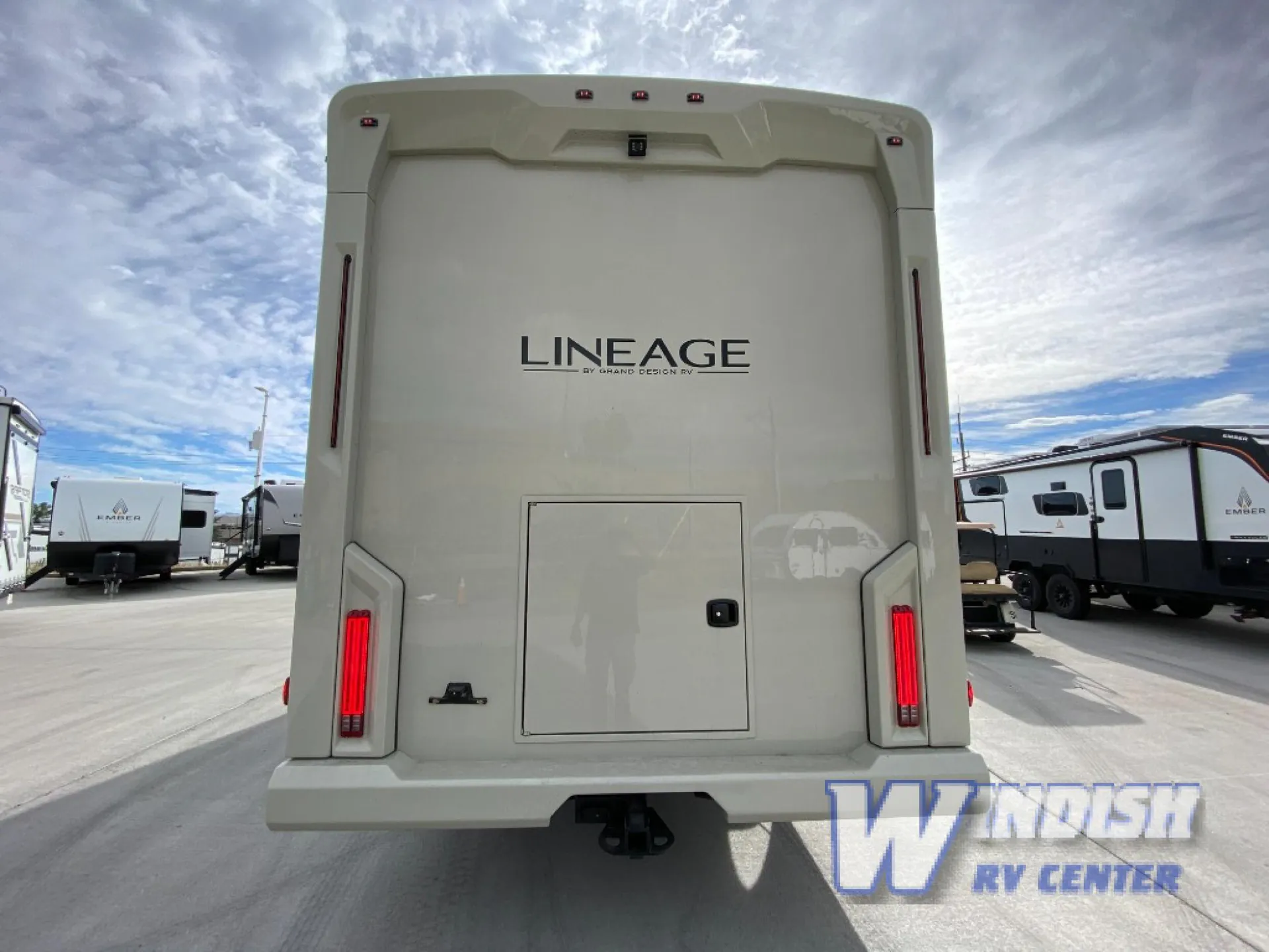 2027 Grand Design Lineage Series F 29AN5 — Rear exterior photograph visibly shows the RV body and a large rear access/storage door