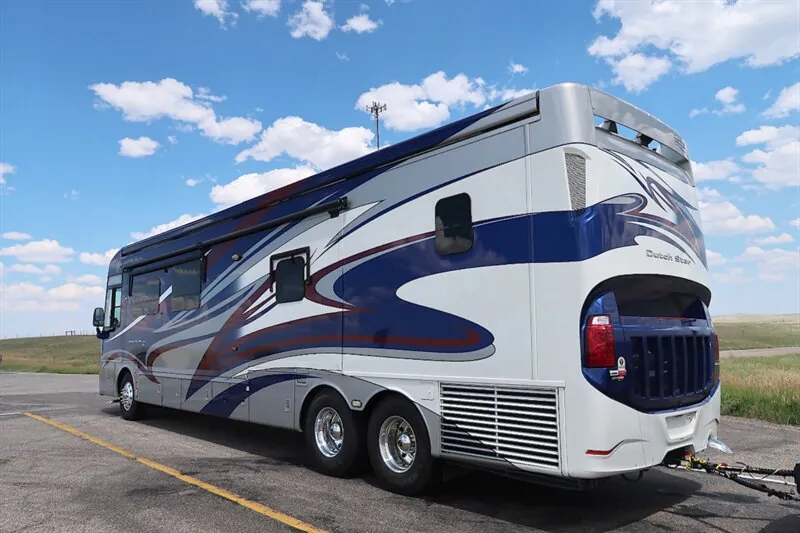 2016 Newmar Dutch Star 4369 — Rear three-quarter photograph visibly shows the outside of the motorhome, rear engine area, wheels, and hitch