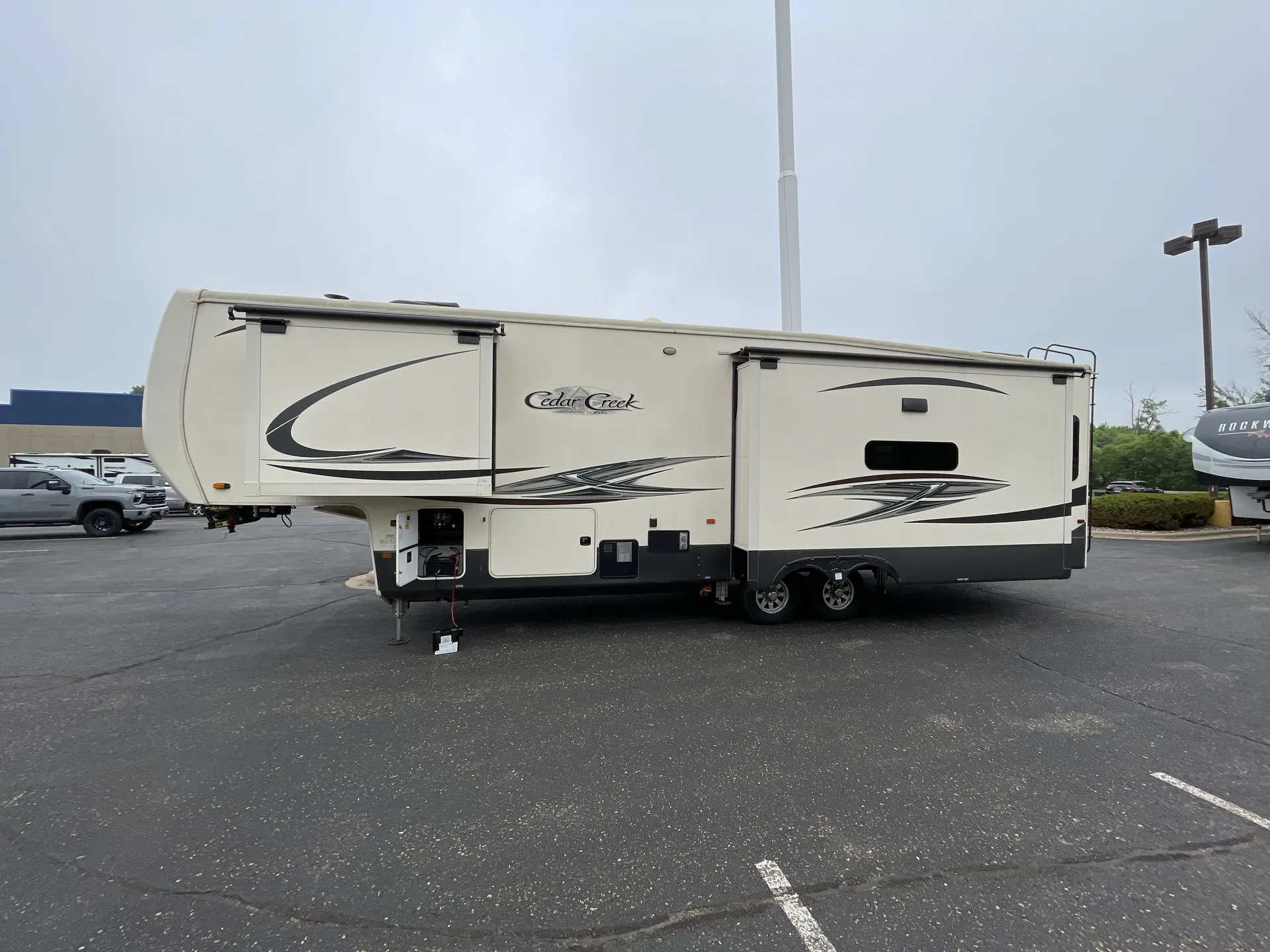 2021 Forest River Cedar Creek Hathaway Edition 34IK — off campside