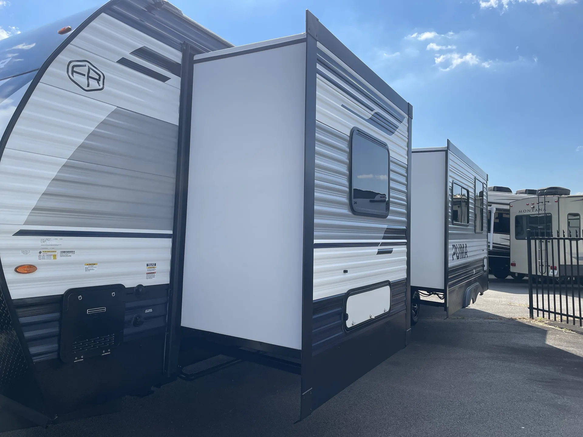 2027 Forest River Puma 32BHFS — off campside