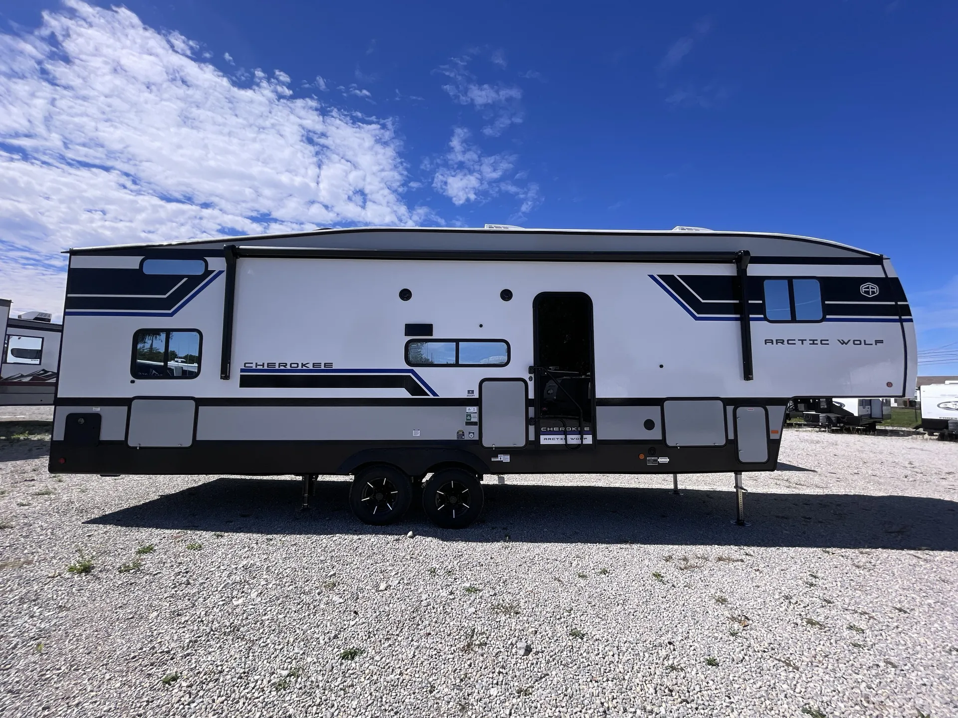 2027 Forest River Arctic Wolf 285OPT — campside