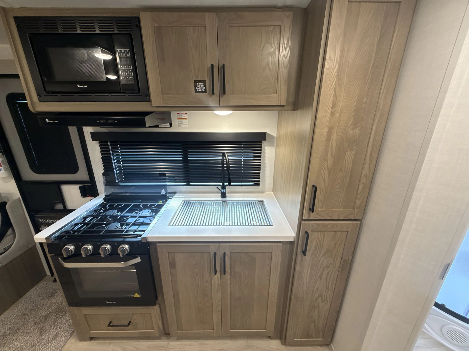 2027 Forest River Rockwood Roo 233S — fridge open