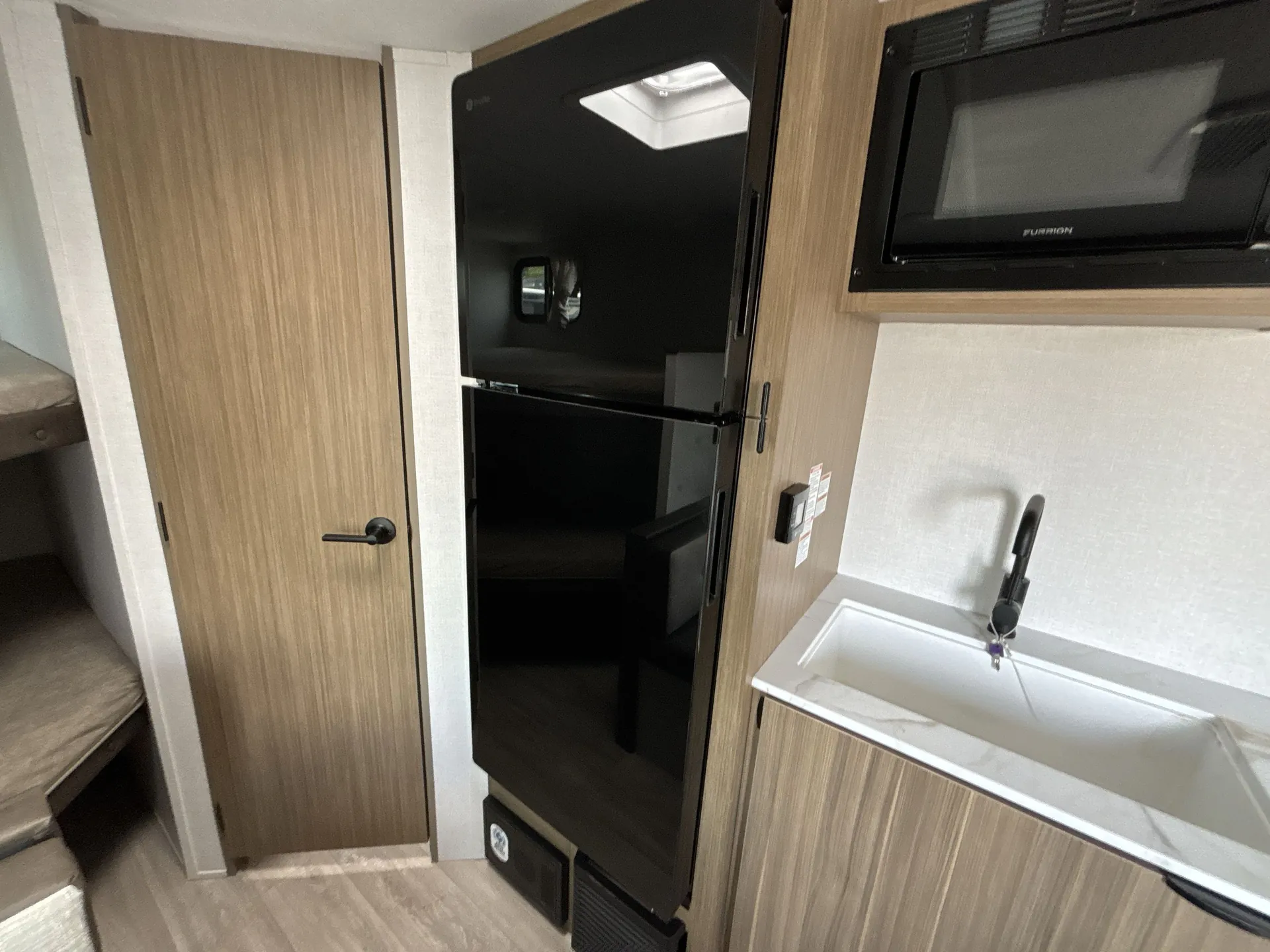 2027 Forest River Wildwood FSX 260BHLE — fridge