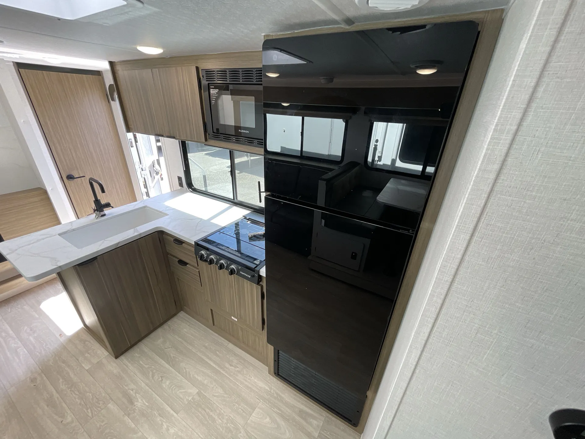 2027 Forest River Wildwood X-Lite 273QBXL — fridge