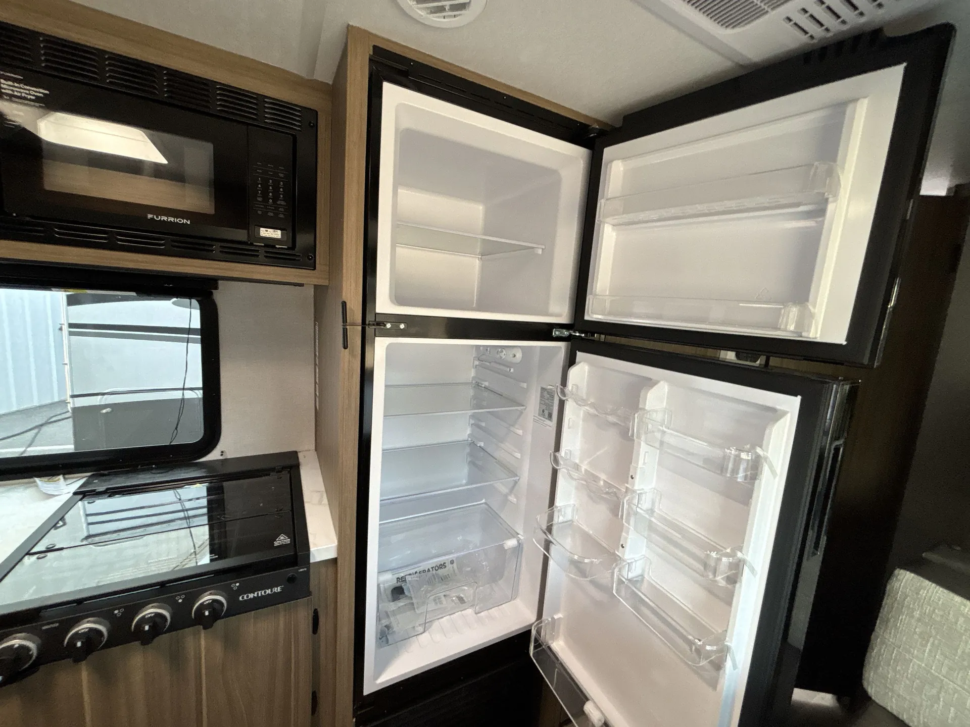 2027 Forest River Wildwood X-Lite 263BHXL — fridge open