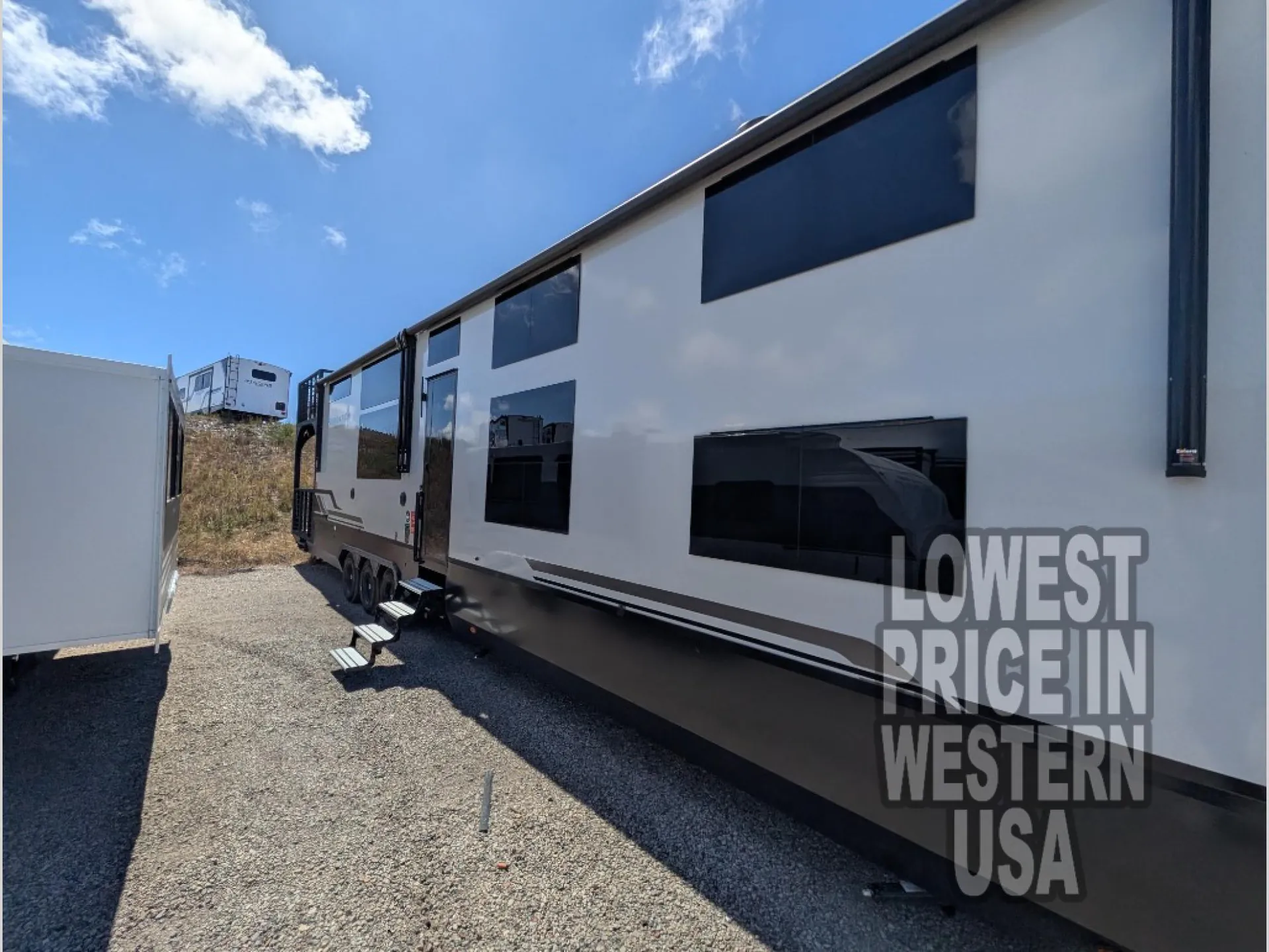 2026 Grand Design Foundation 42GD — The RV's exterior side wall, windows, slide-outs, and lower body
