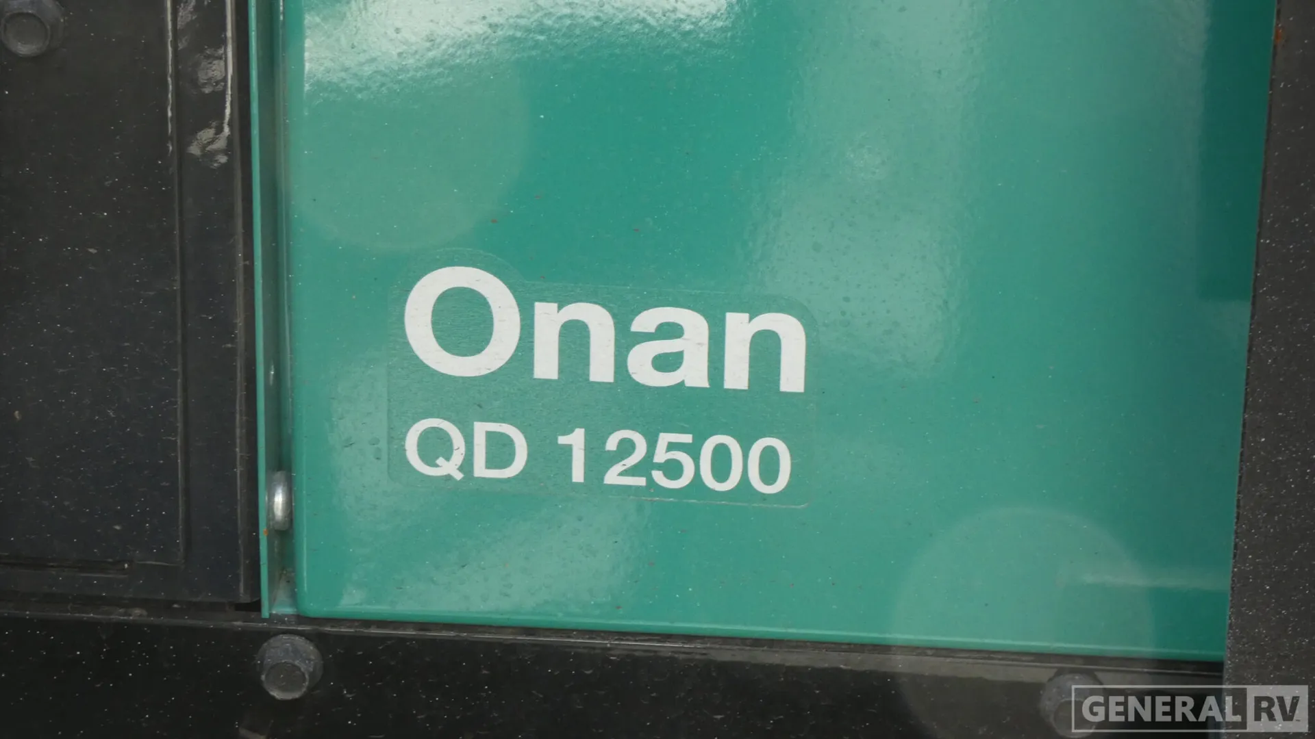 2026 American Coach American Dream 45A — Close photograph of the exterior-installed Onan QD 12500 generator