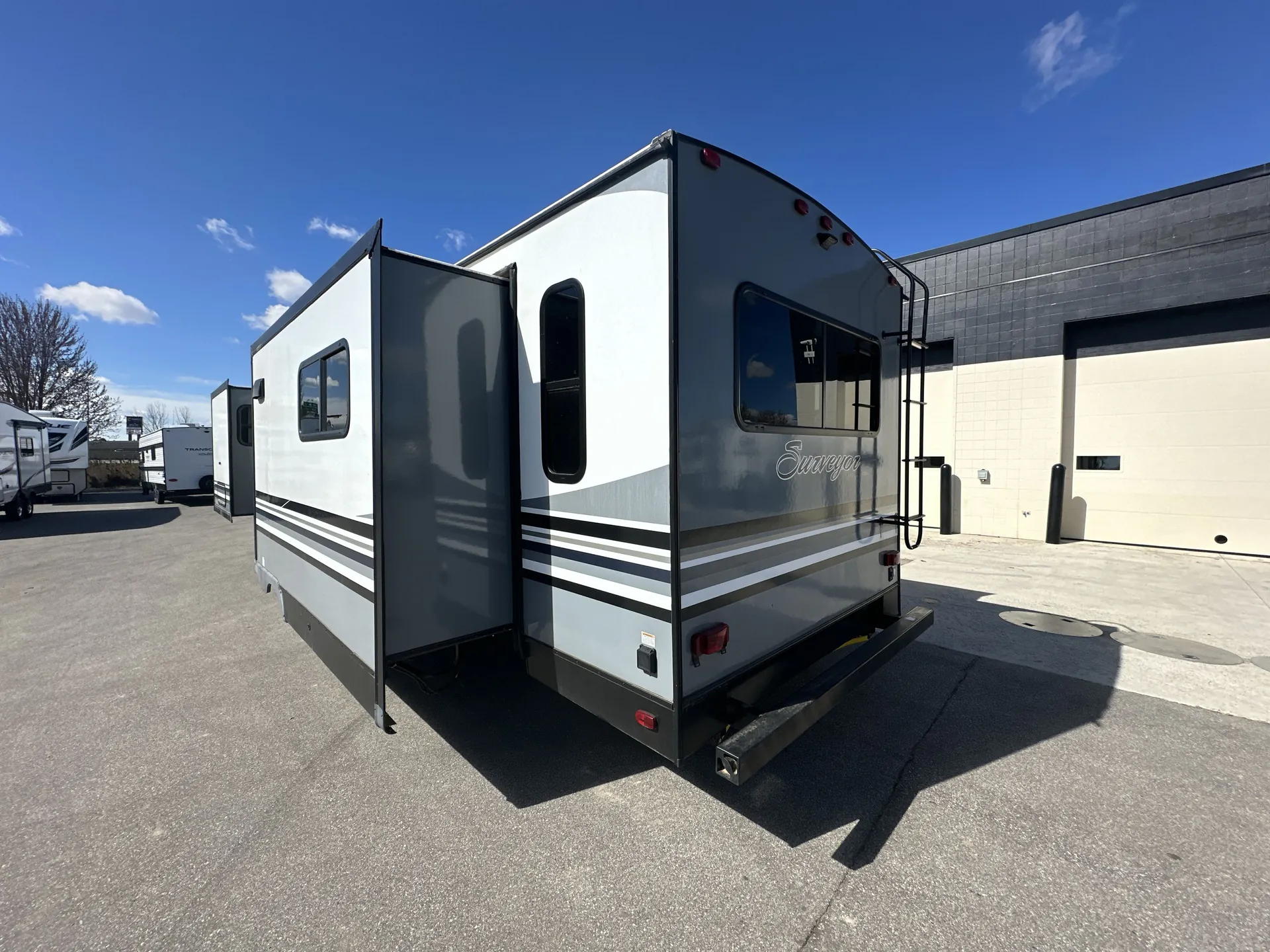 2018 Forest River Surveyor 33KRLOK — off campside