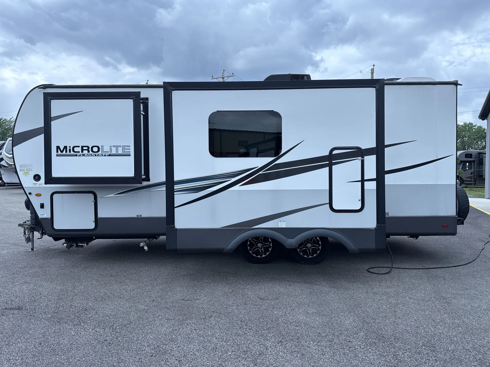 2023 Forest River Flagstaff Micro Lite 25BSDS — off campside
