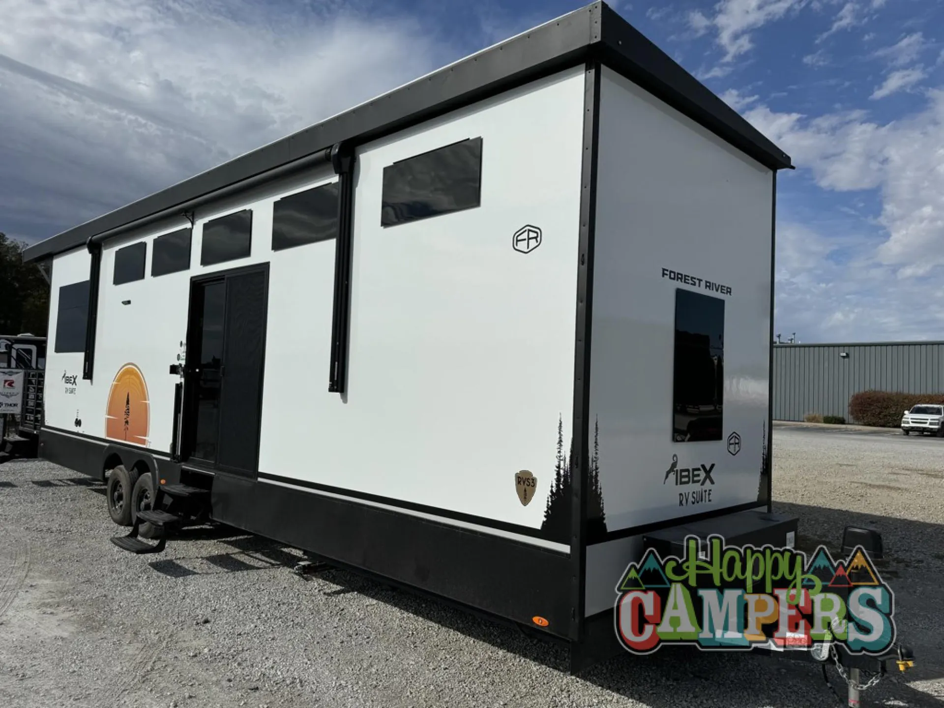 2025 Forest River IBEX RVS3 — Exterior photograph of the RV shell, side wall, windows, door, wheels, and hitch