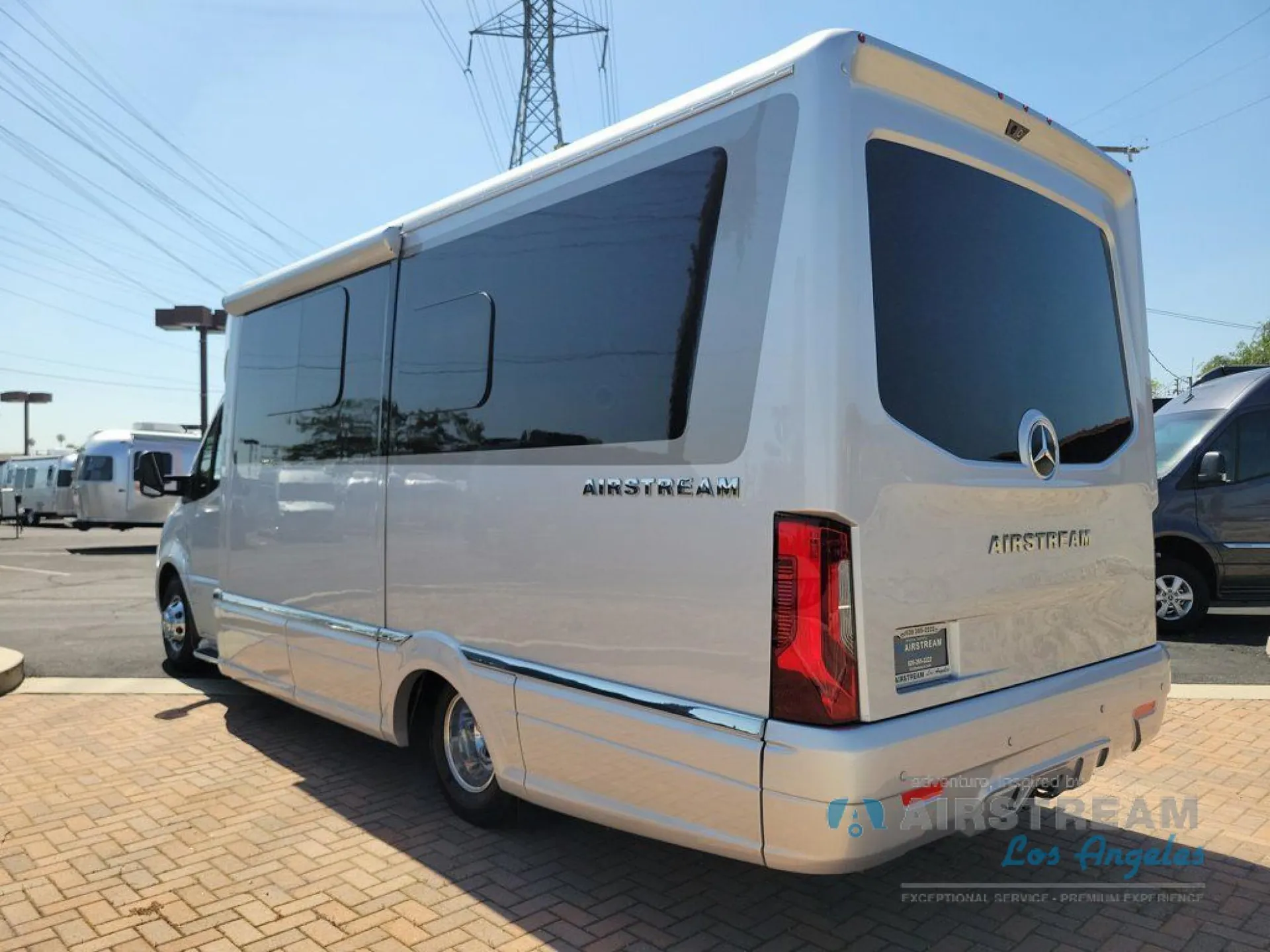 2026 Airstream Atlas Murphy Suite — Photograph clearly shows the rear and exterior side of the motorhome