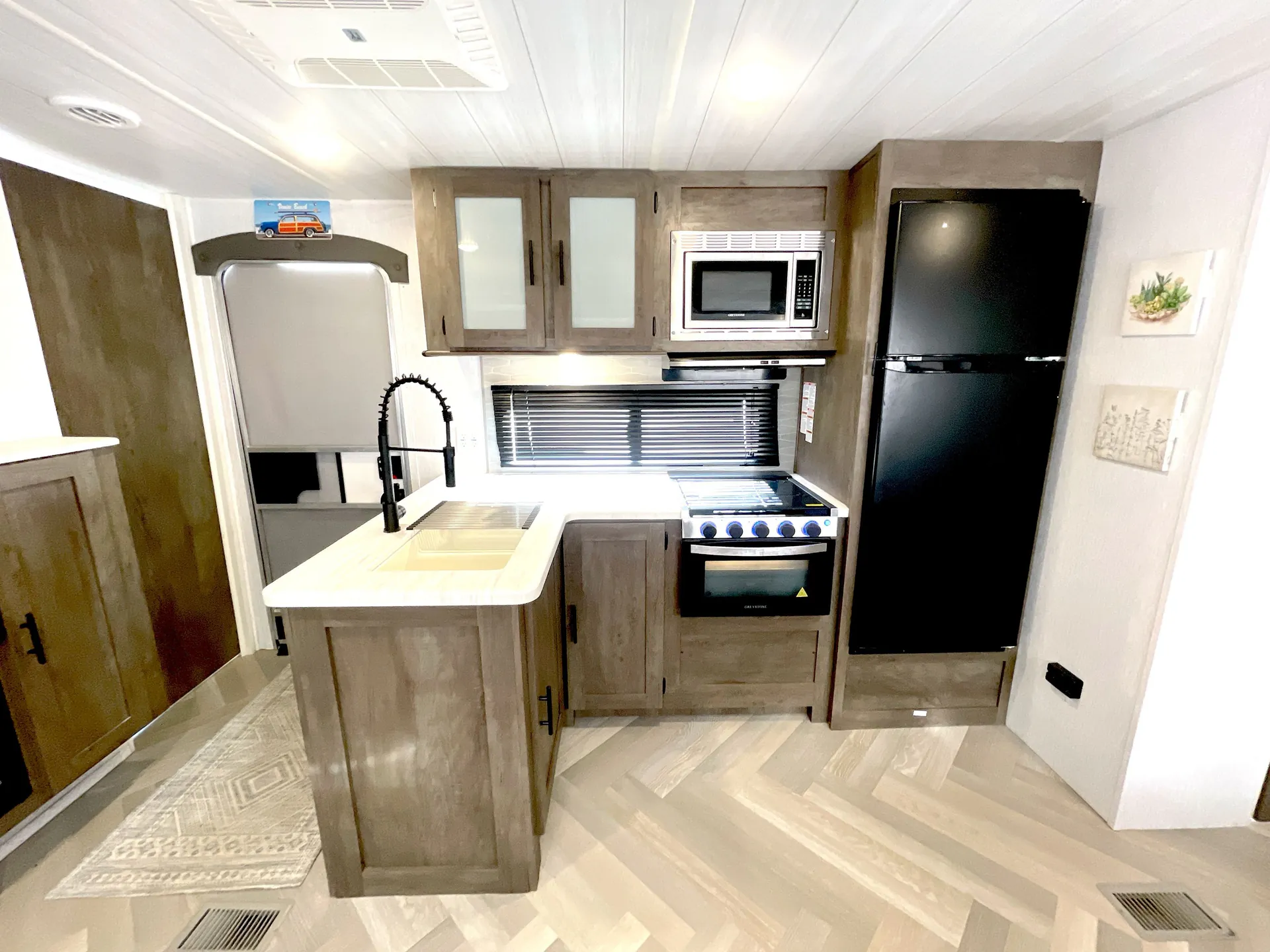 2023 Forest River Wildwood 31KQBTS — fridge open