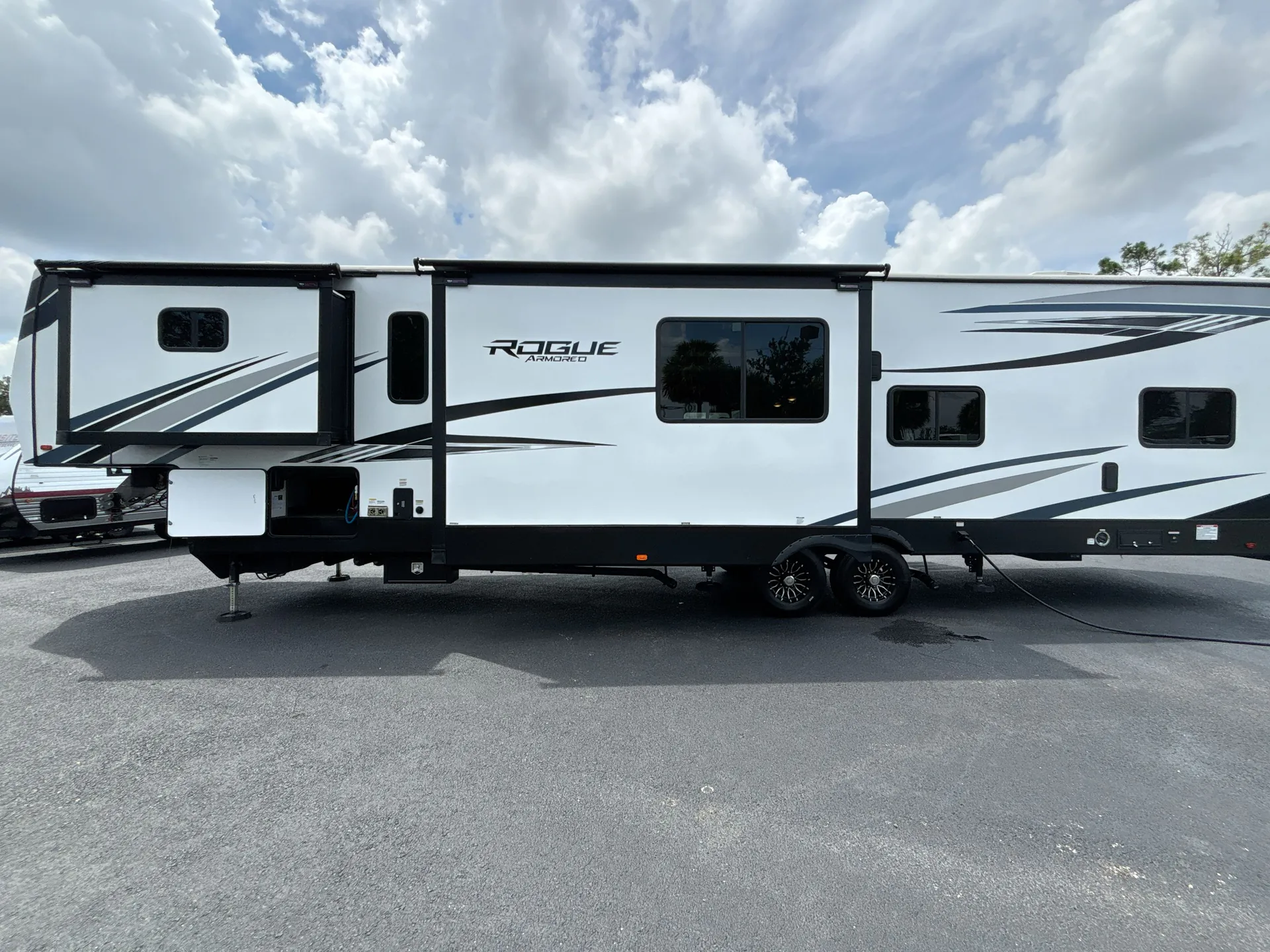 2023 Forest River Vengeance Rogue Armored 4007 — off campside