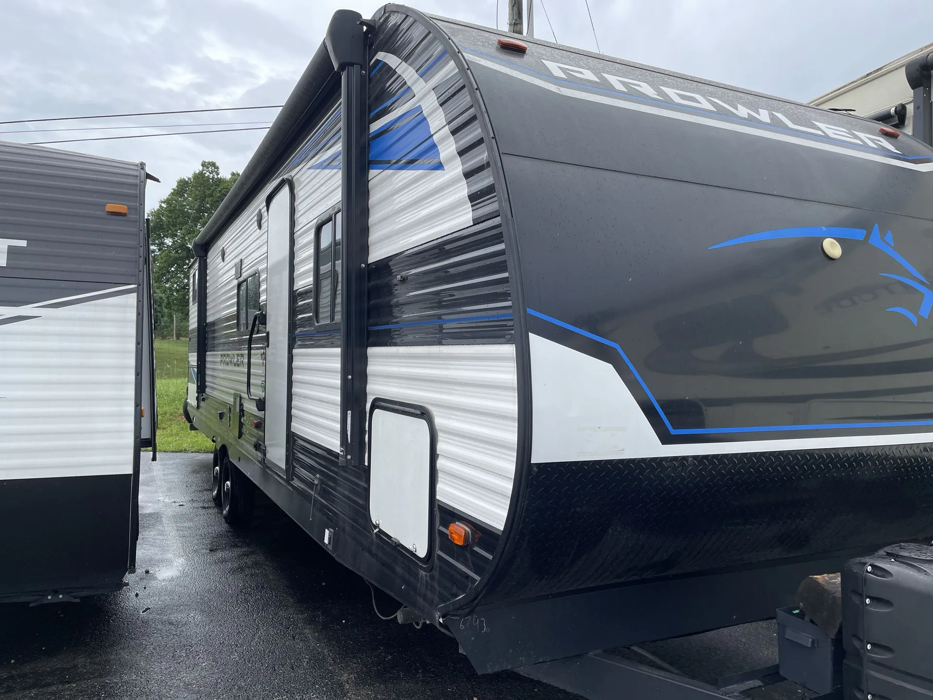 2023 Heartland Prowler 303BH — campside