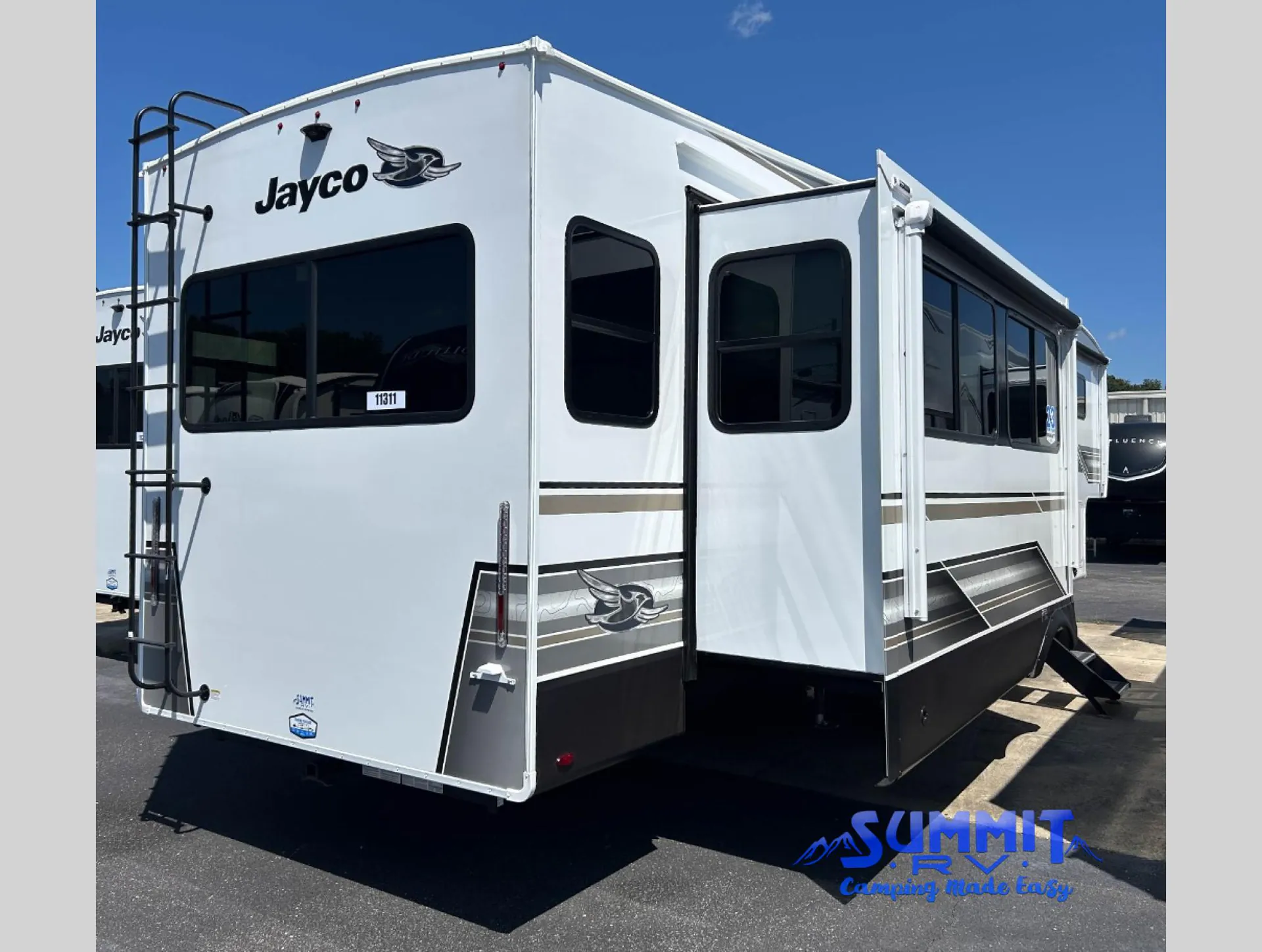 2027 Jayco Eagle 355MBQS — The rear and side exterior of the fifth-wheel RV with slide-outs and ladder