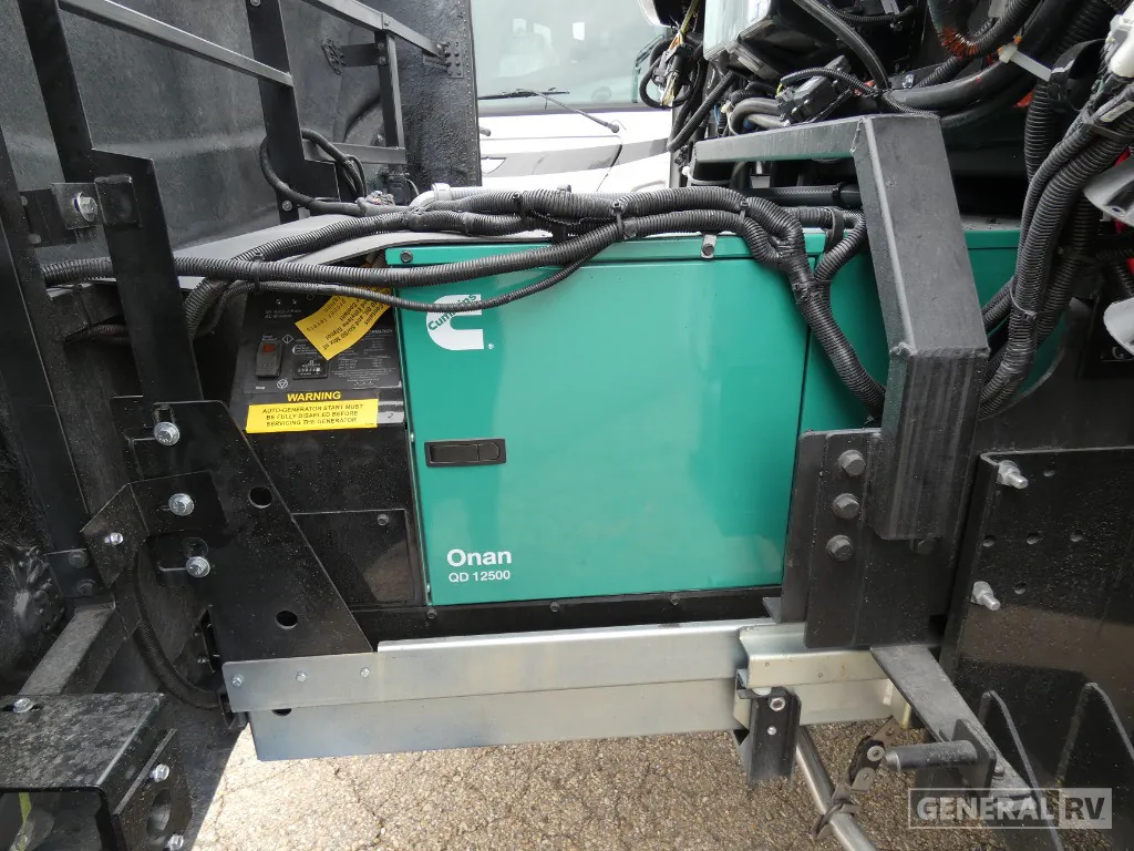 2026 American Coach American Dream 45A — Exterior service area visibly contains an Onan QD 12500 generator and associated wiring and hardware