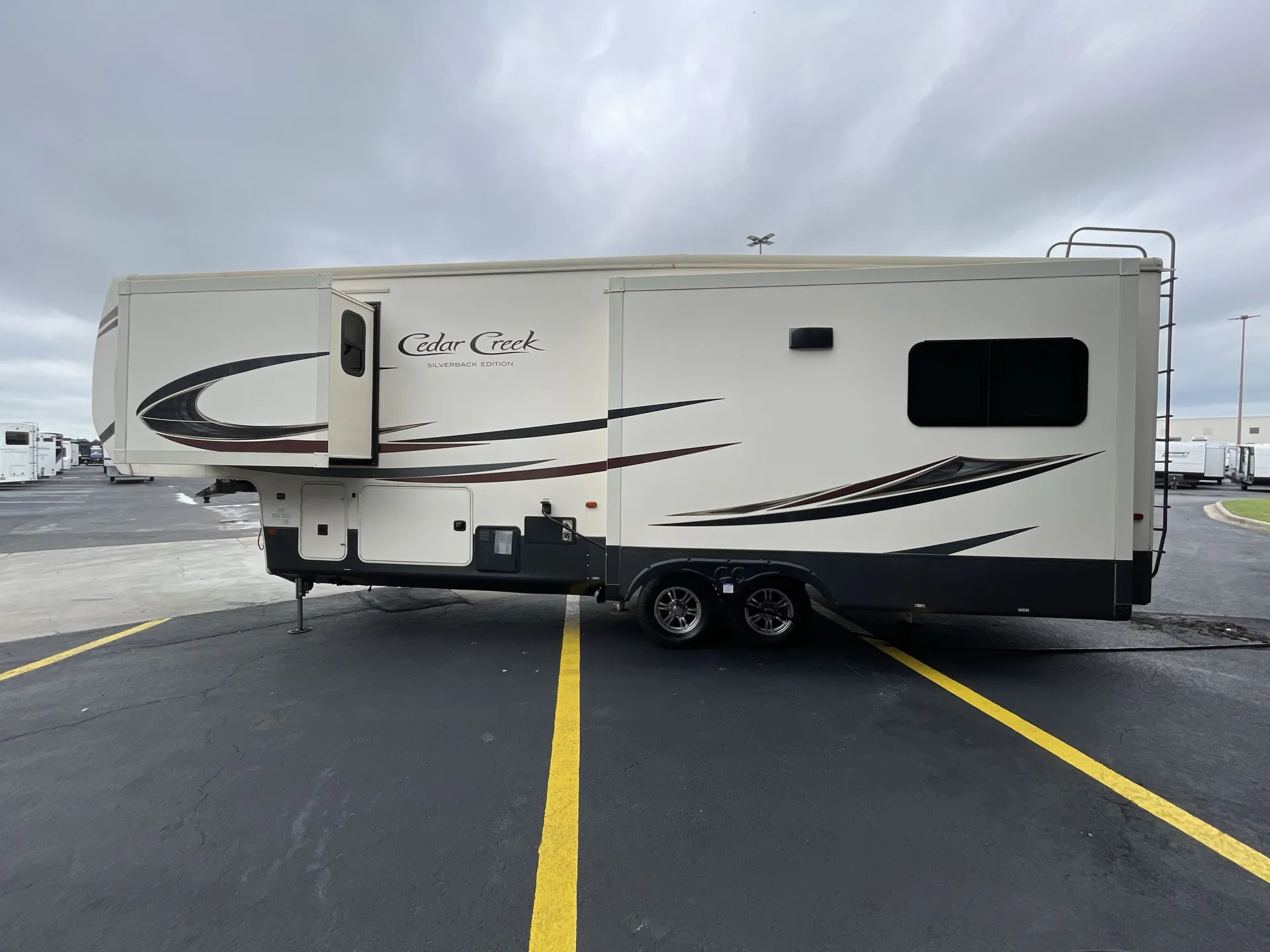 2021 Forest River Cedar Creek Silverback 29RW — off campside
