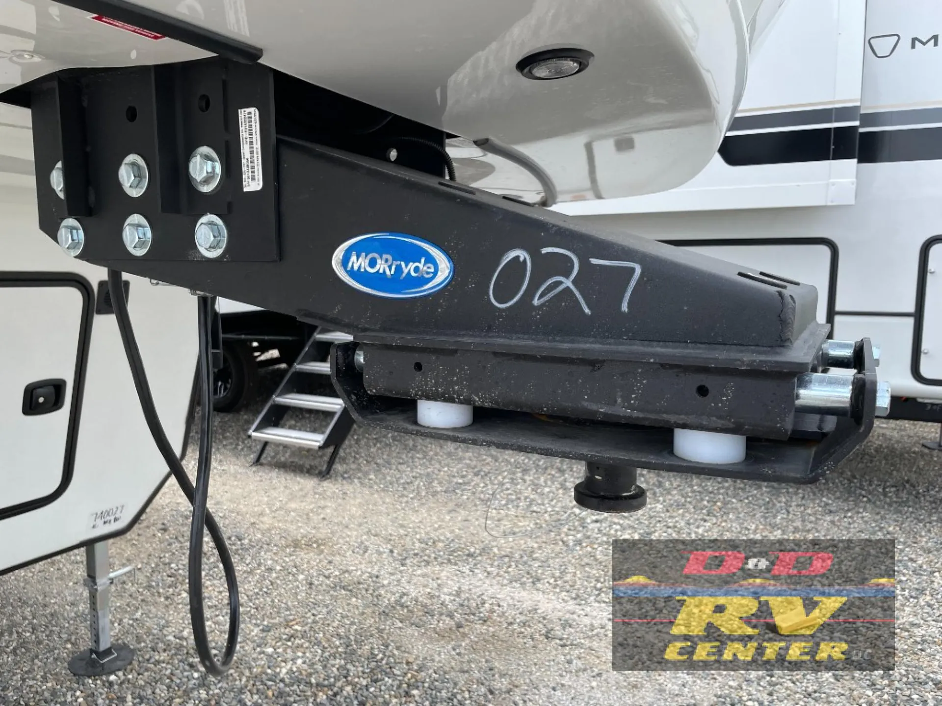 2026 Keystone Montana High Country 377FL — Close exterior photograph visibly shows the fifth-wheel hitch pin box and MorRyde coupling hardware