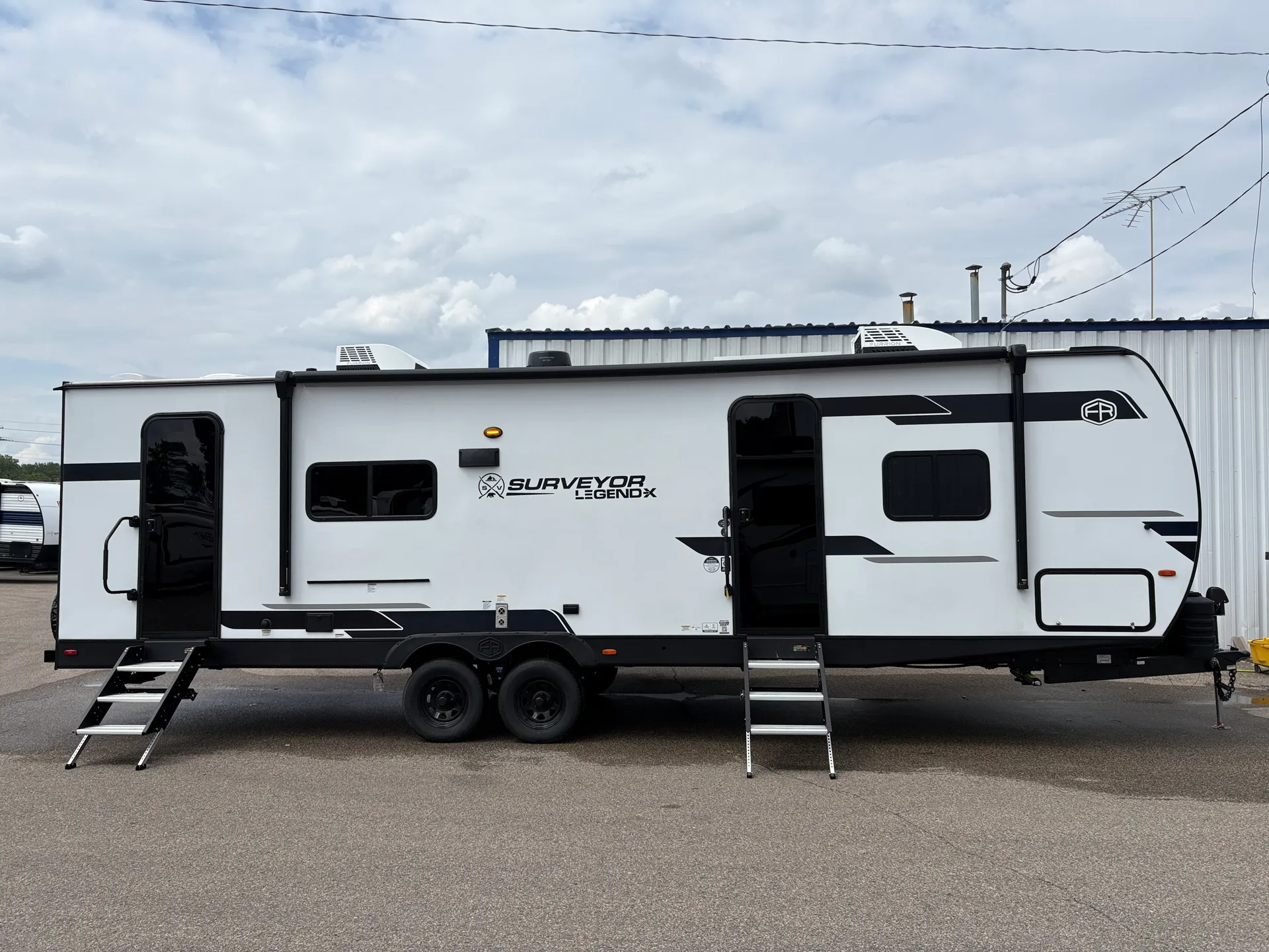 2025 Forest River Surveyor Legend X 27CAMP dealer photo 2 from A.C. Nelsen RV World