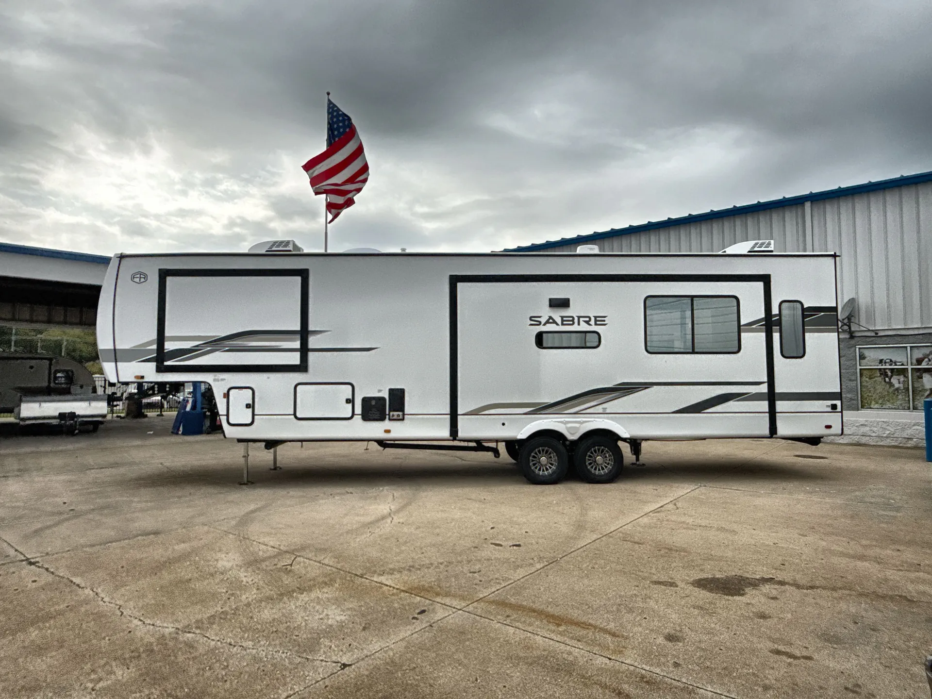2026 Forest River Sabre 33RLP — off campside