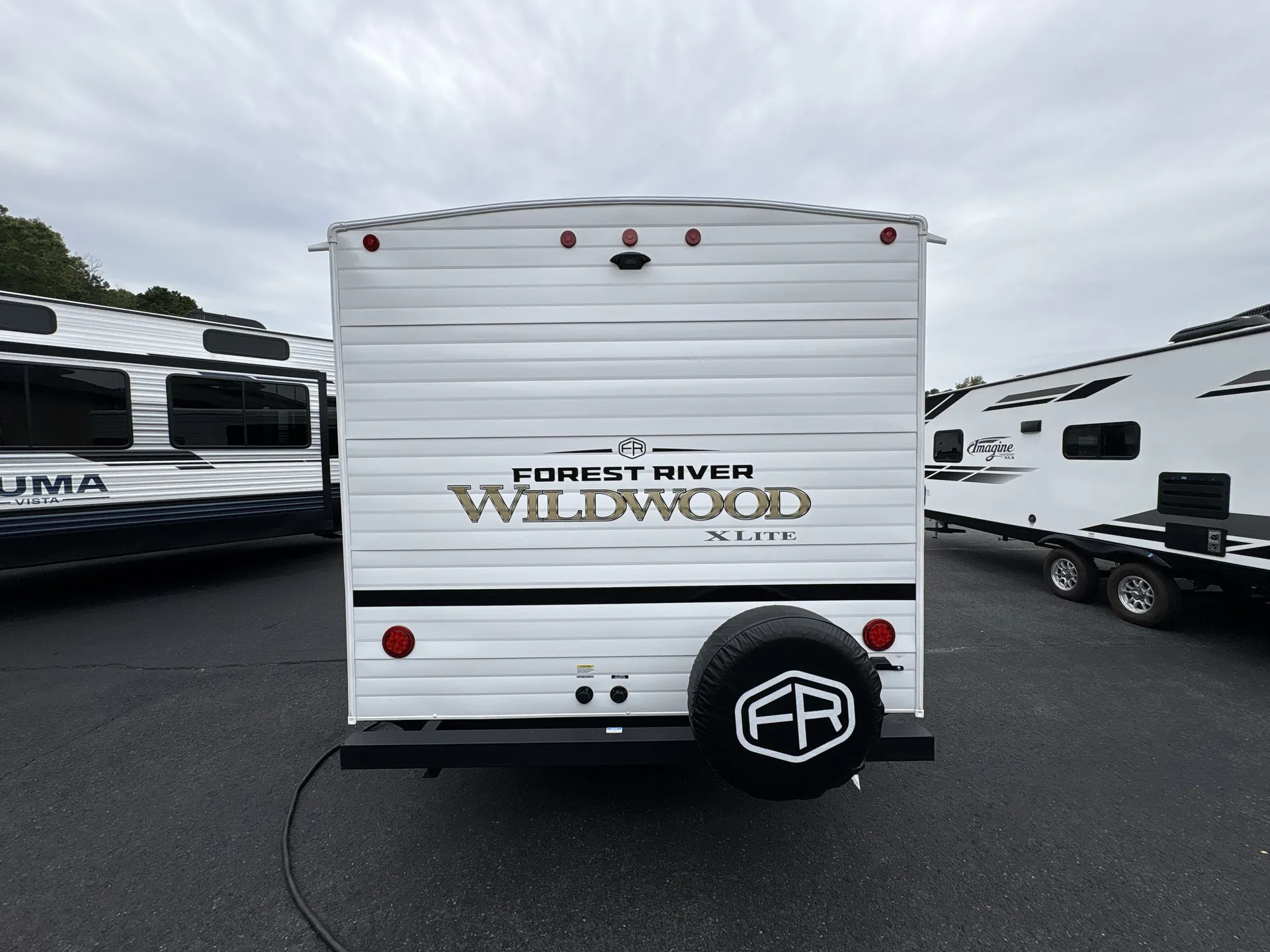 2027 Forest River Wildwood X-Lite 273QBXL — campside