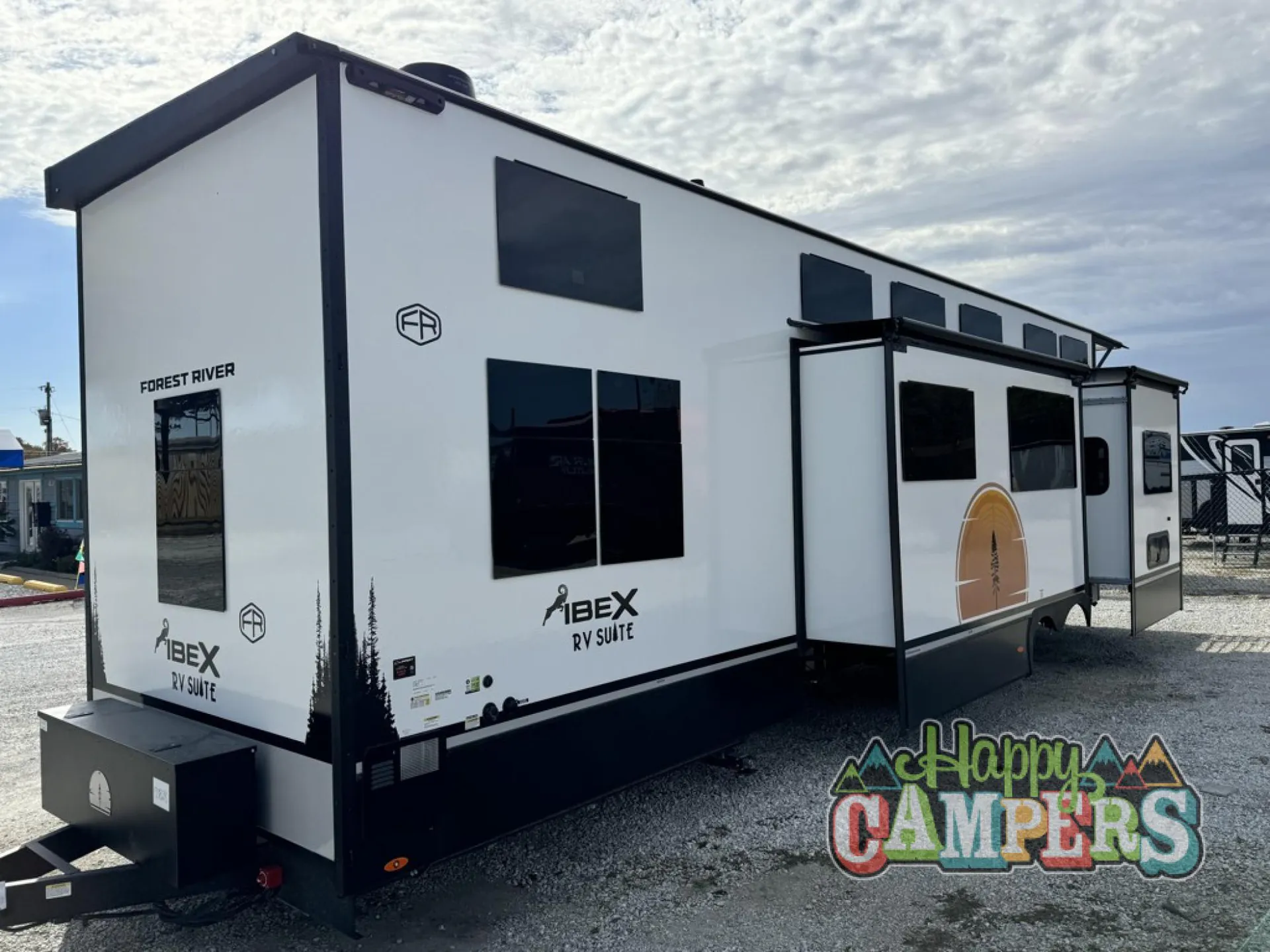 2025 Forest River IBEX RVS3 — Exterior photograph showing the RV body, front hitch, windows, and slide-out