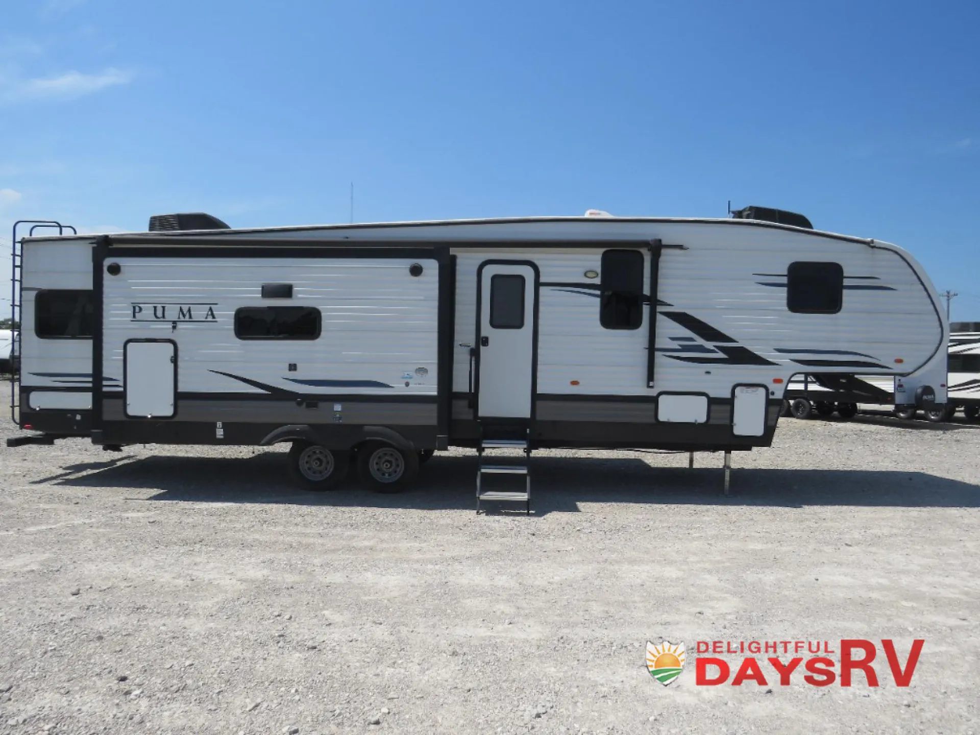 2022 Palomino Puma 315BHTS dealer photo 2 from Delightful Days