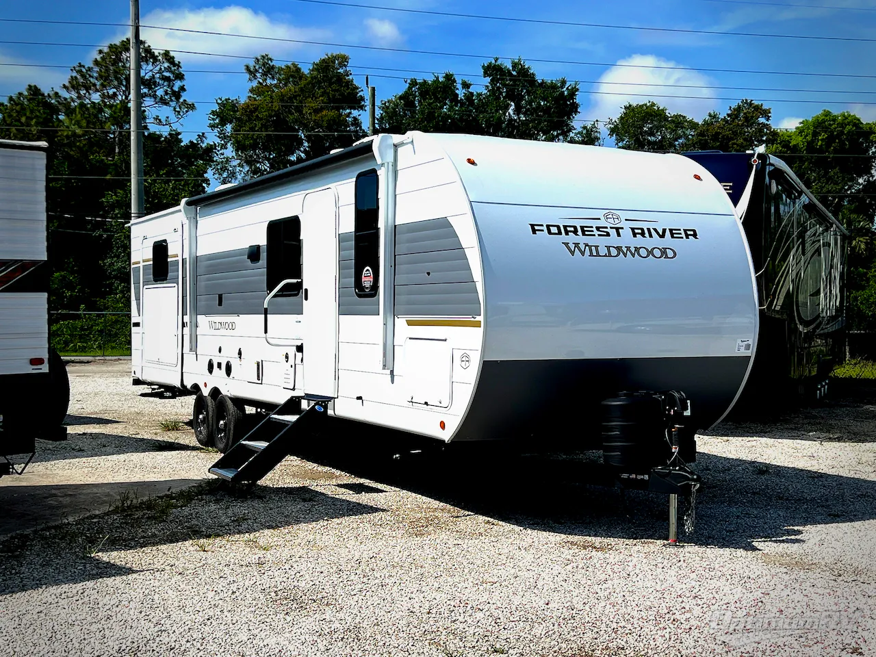 2026 Forest River Wildwood 31KQBTS dealer photo 1 from Optimum RV