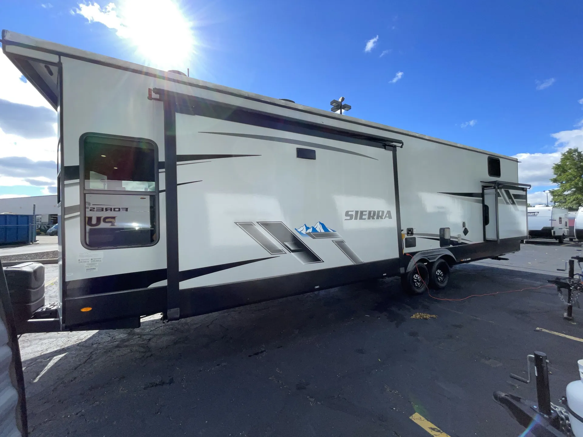 2022 Forest River Sierra Destination 399LOFT — off campside