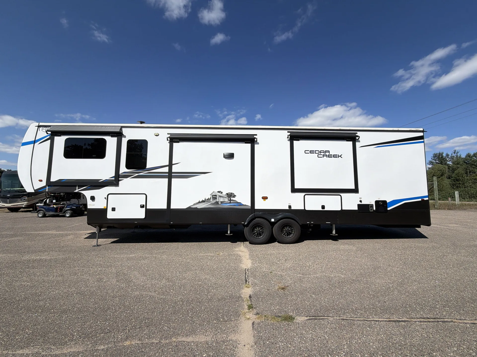 2025 Forest River Cedar Creek 370FL — off campside