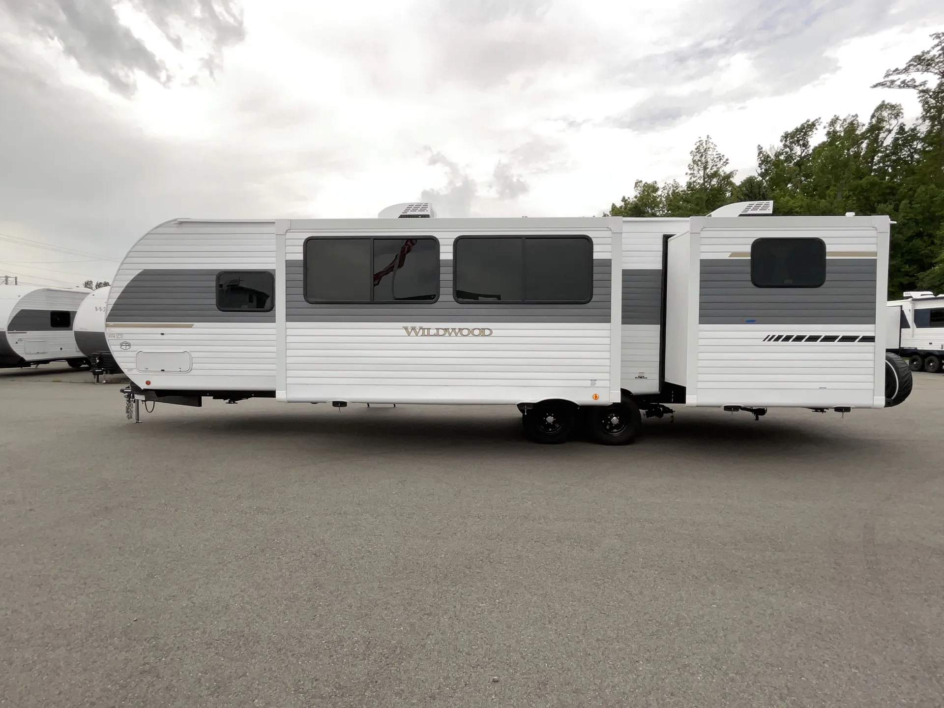 2027 Forest River Wildwood 31KQBTS — campside