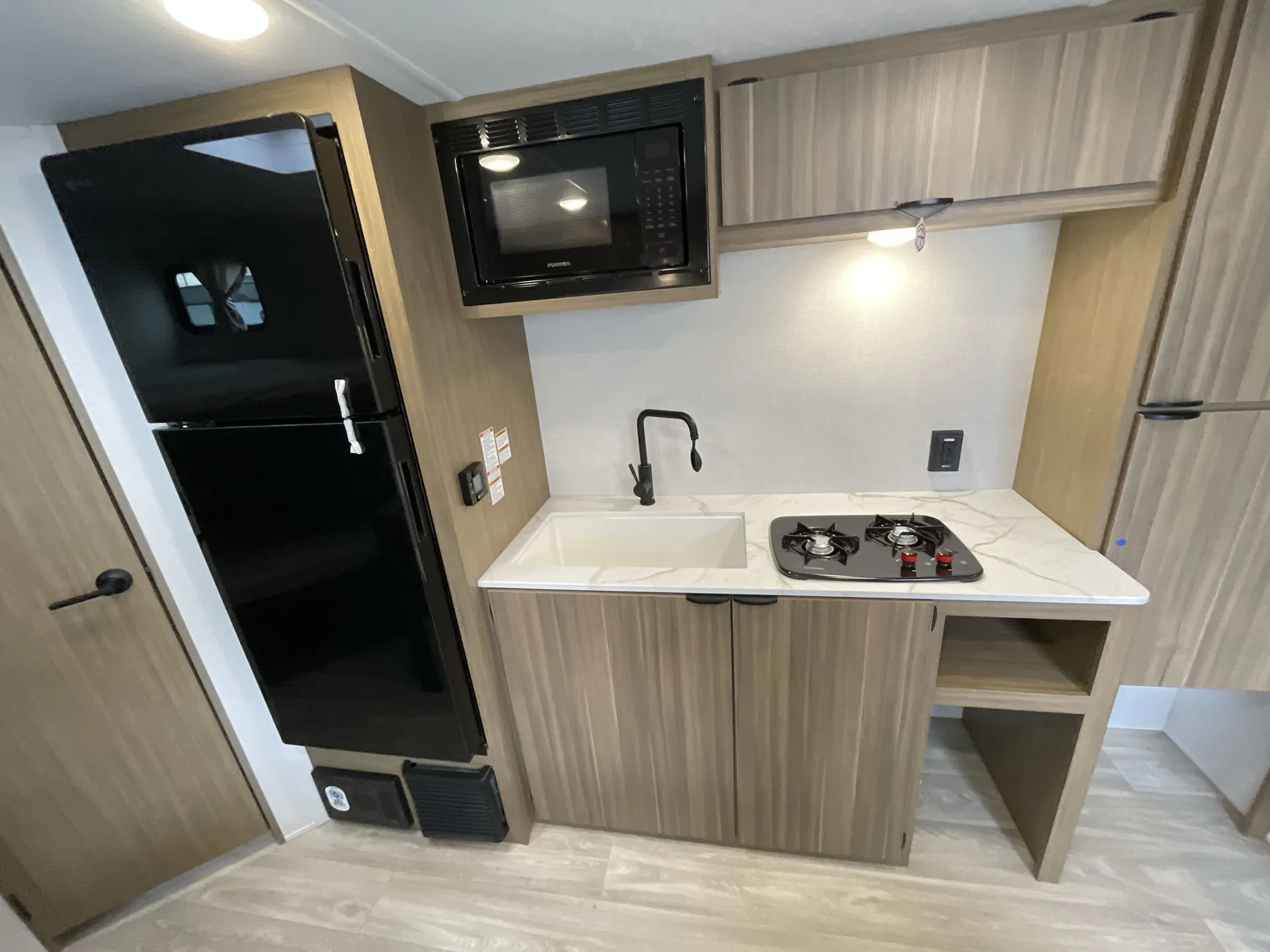 2027 Forest River Wildwood FSX 260BHLE — fridge