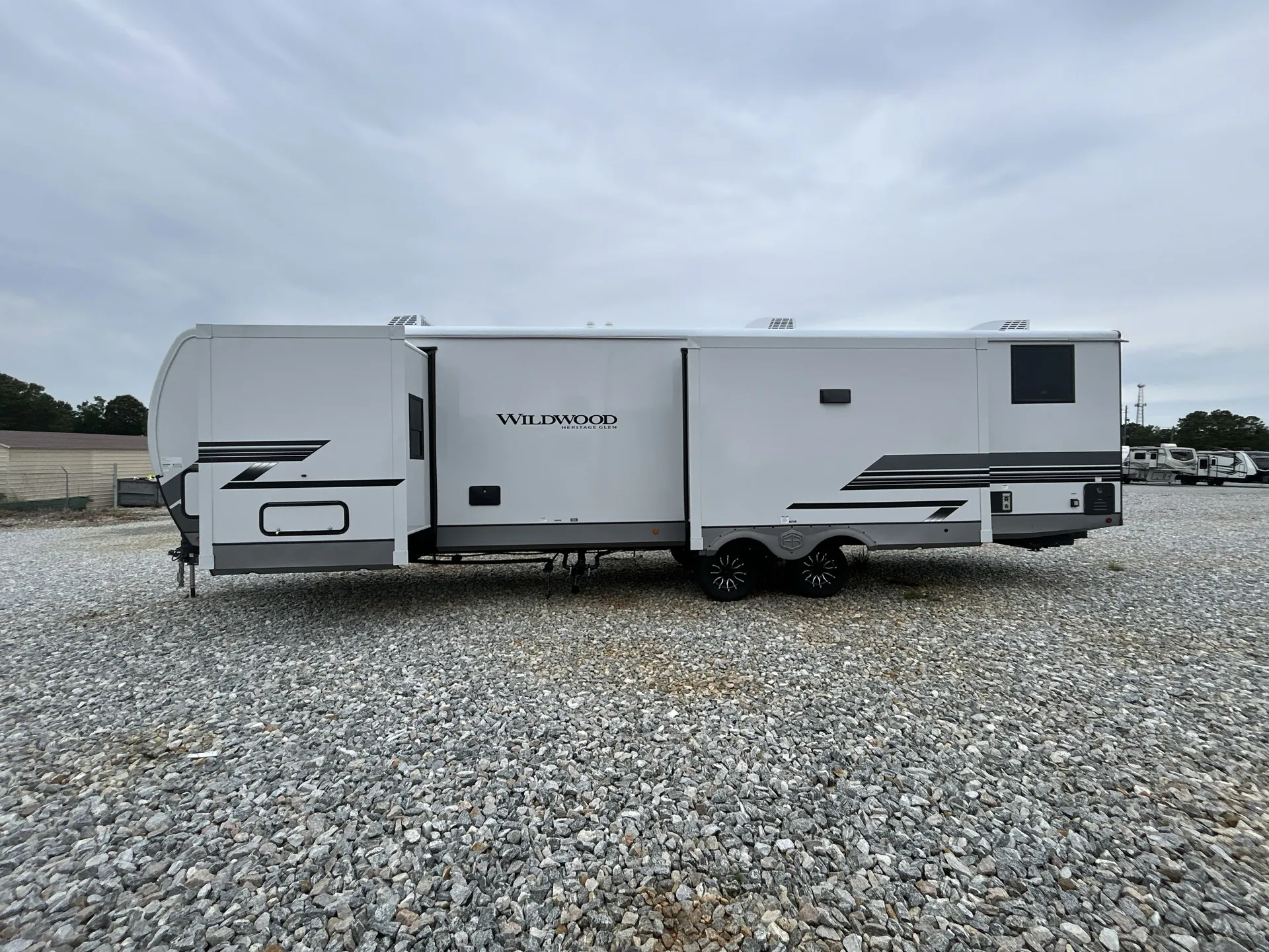 2027 Forest River Wildwood Heritage Glen 301FAM — off campside