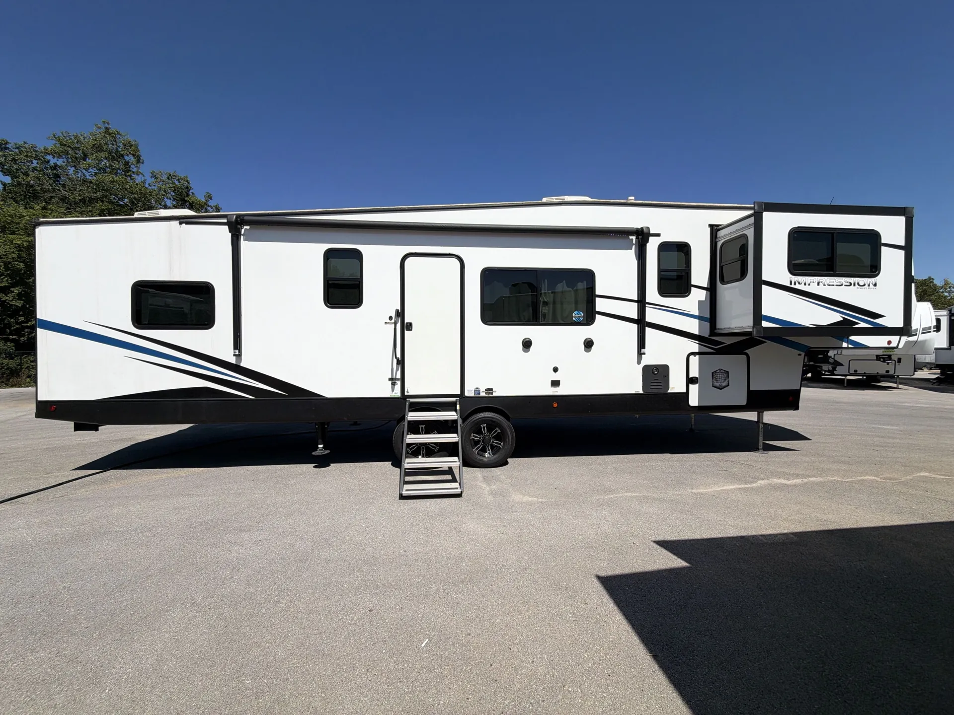 2023 Forest River Impression 320FL — campside