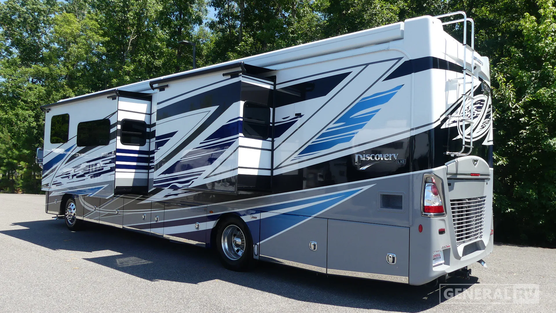 2027 Fleetwood Discovery LXE 40M — The rear and side exterior of the motorhome, including slide-outs, wheels, and storage doors
